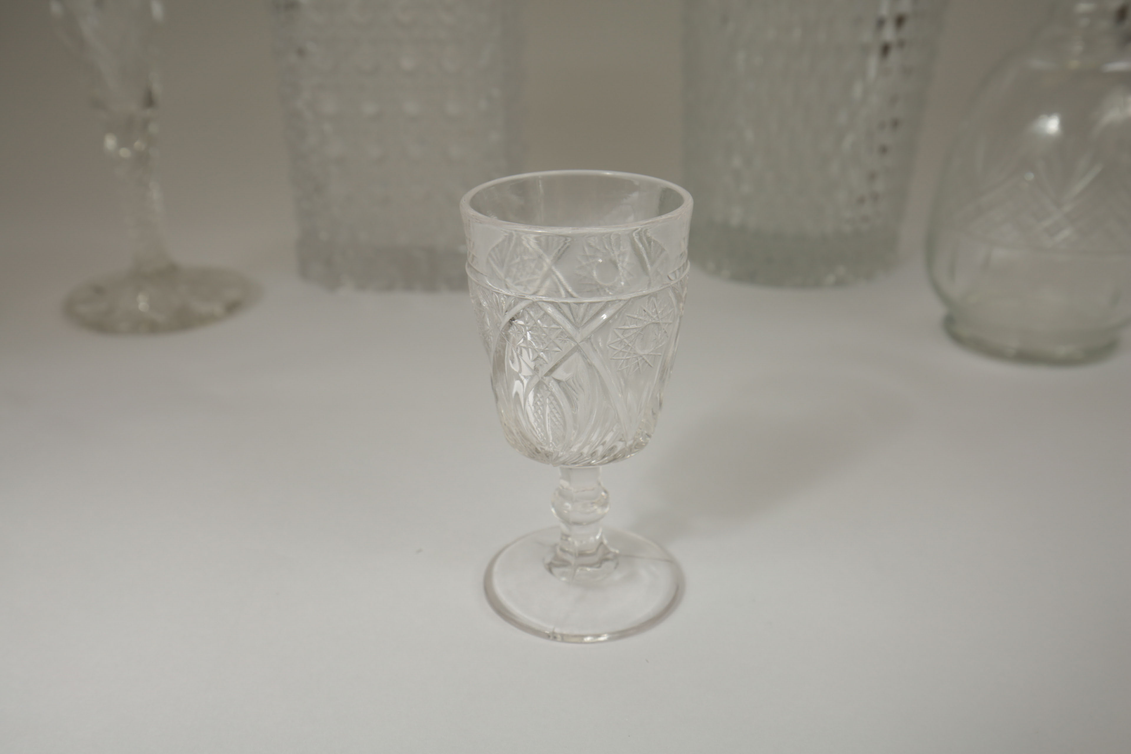 Collection of Crystal Decanters and Shot Glasses