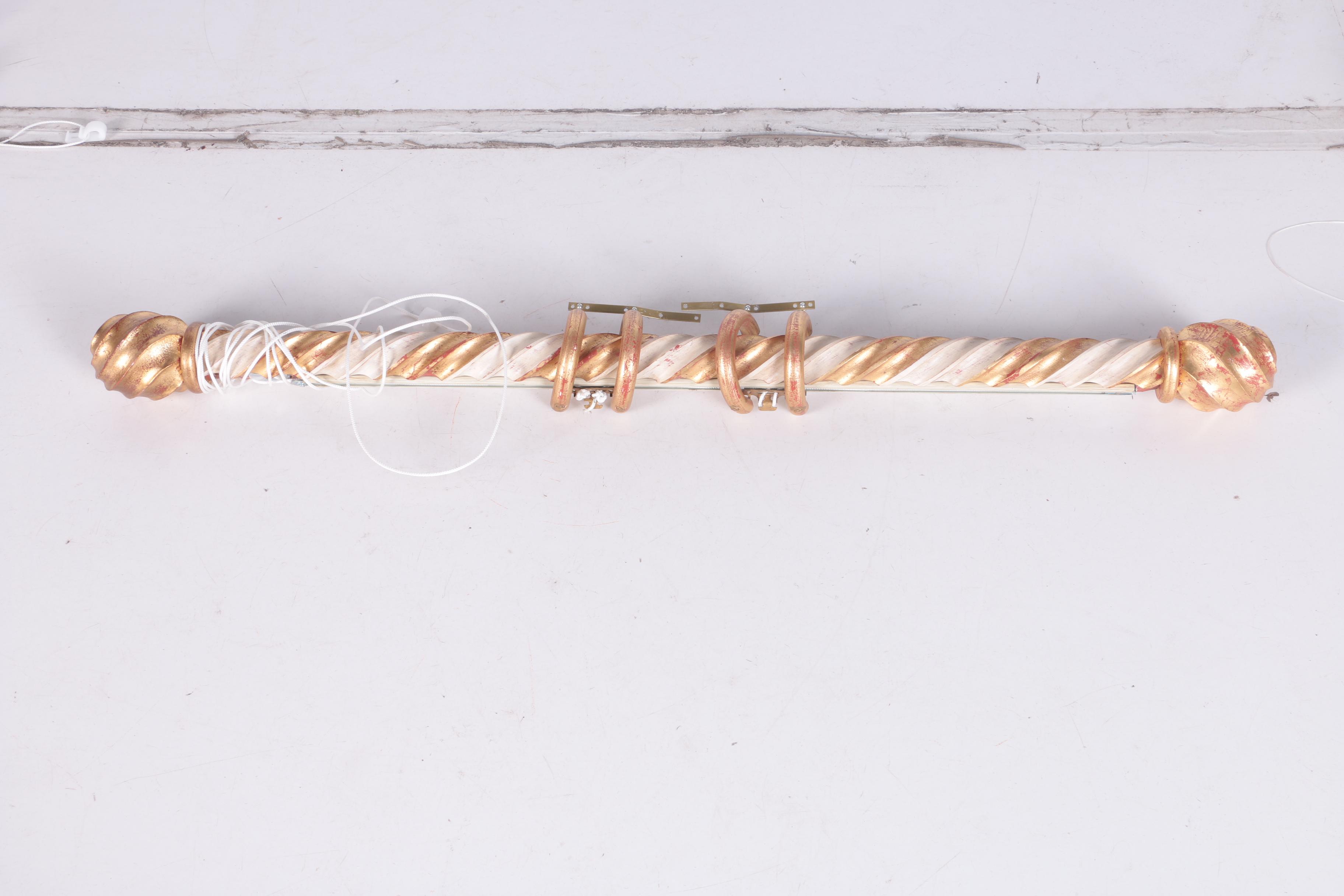 Collection of Ornate Curtain Rods and Rings