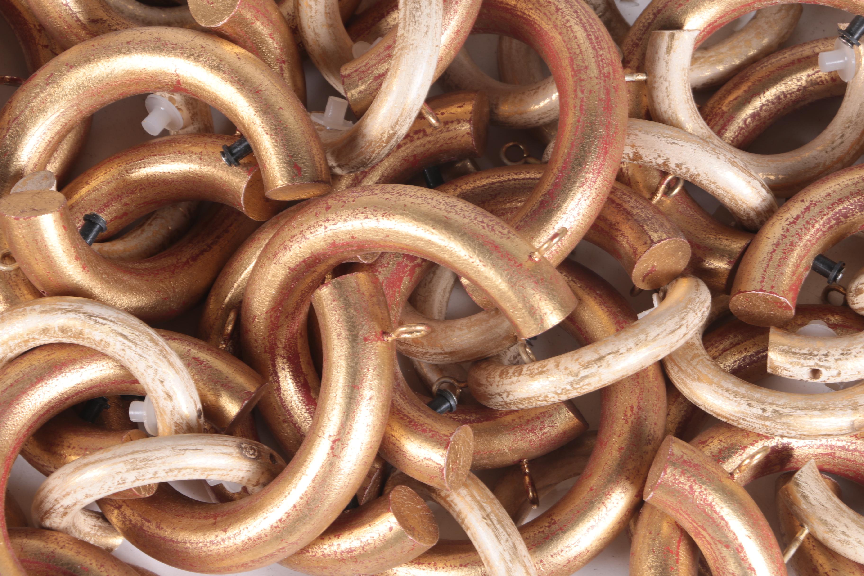 Collection of Ornate Curtain Rods and Rings