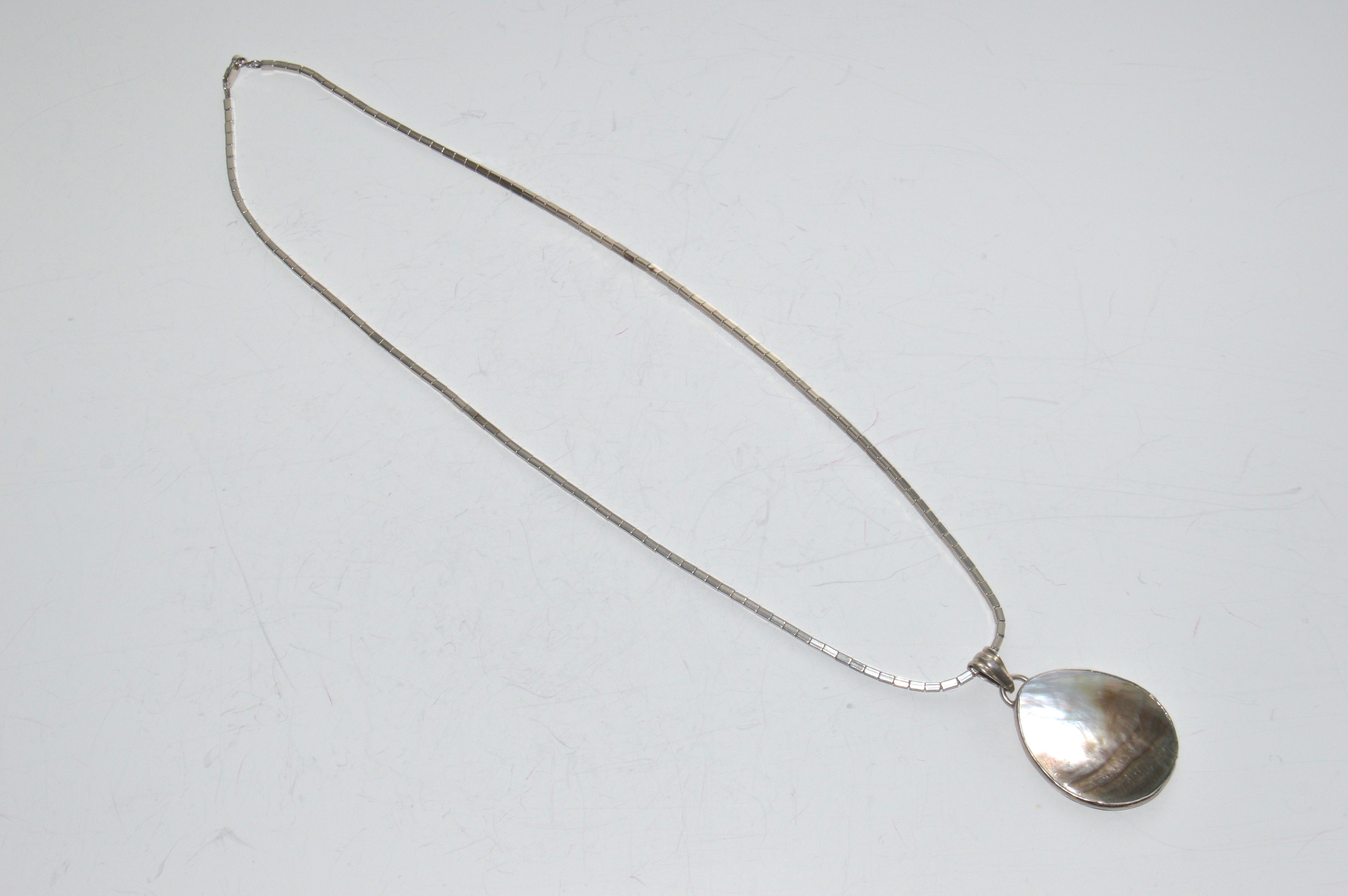 Sterling Silver Necklaces and Earrings with Shell and Pearl Pendants