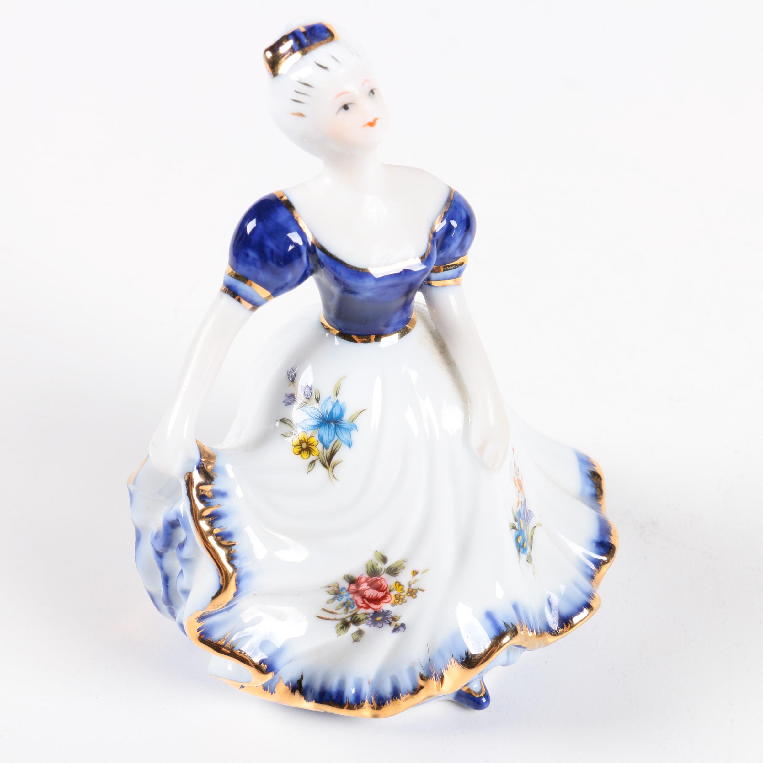 Limoges Girl in Floral Dress Figurine