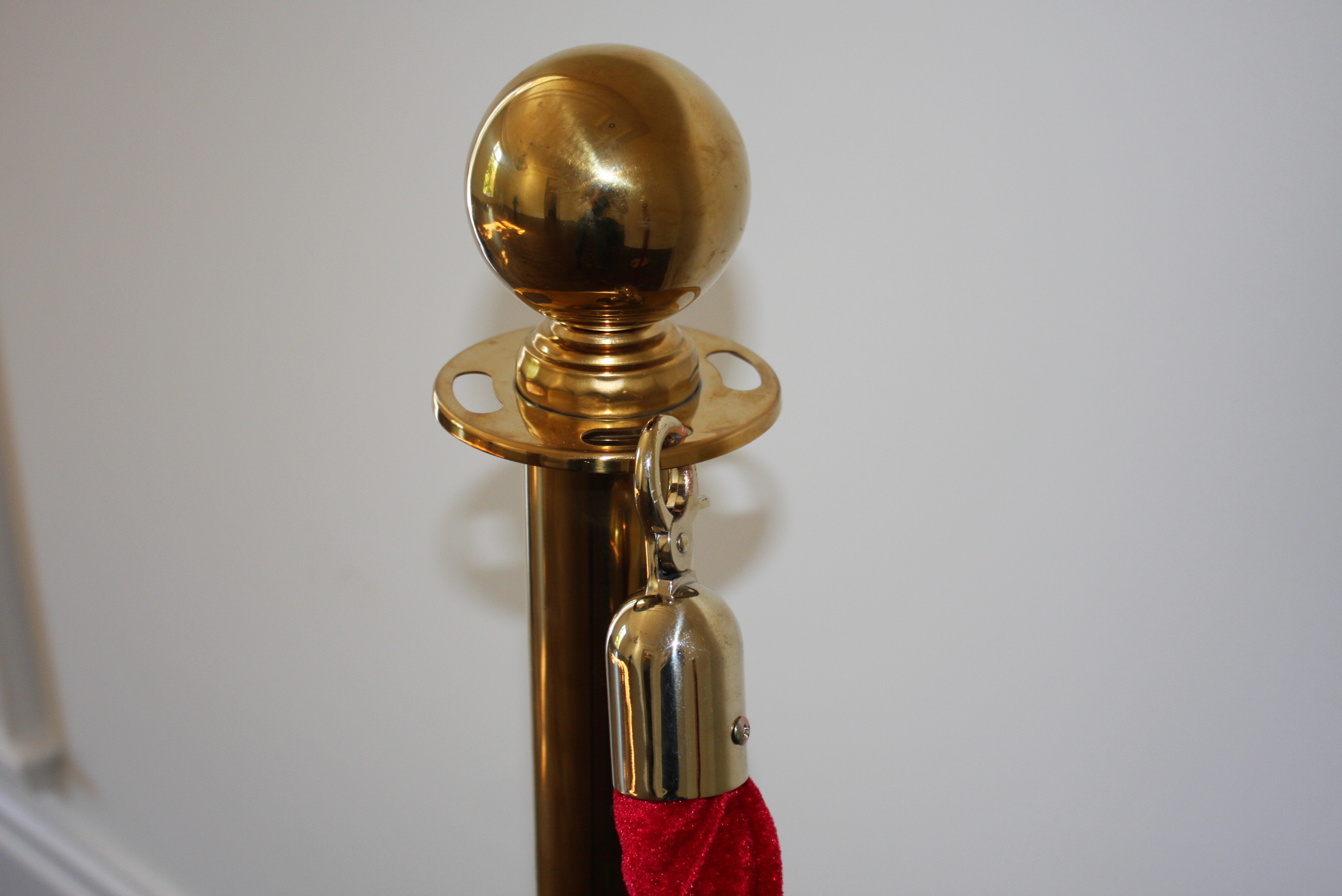 Pair of Brass Stanchions with a Red Velvet Rope