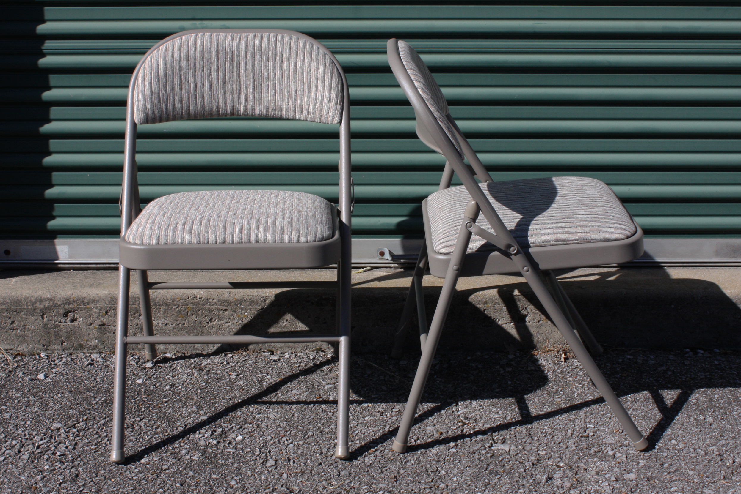 Grouping of "Sudden Comfort" Folding Chairs by Meco Corp.