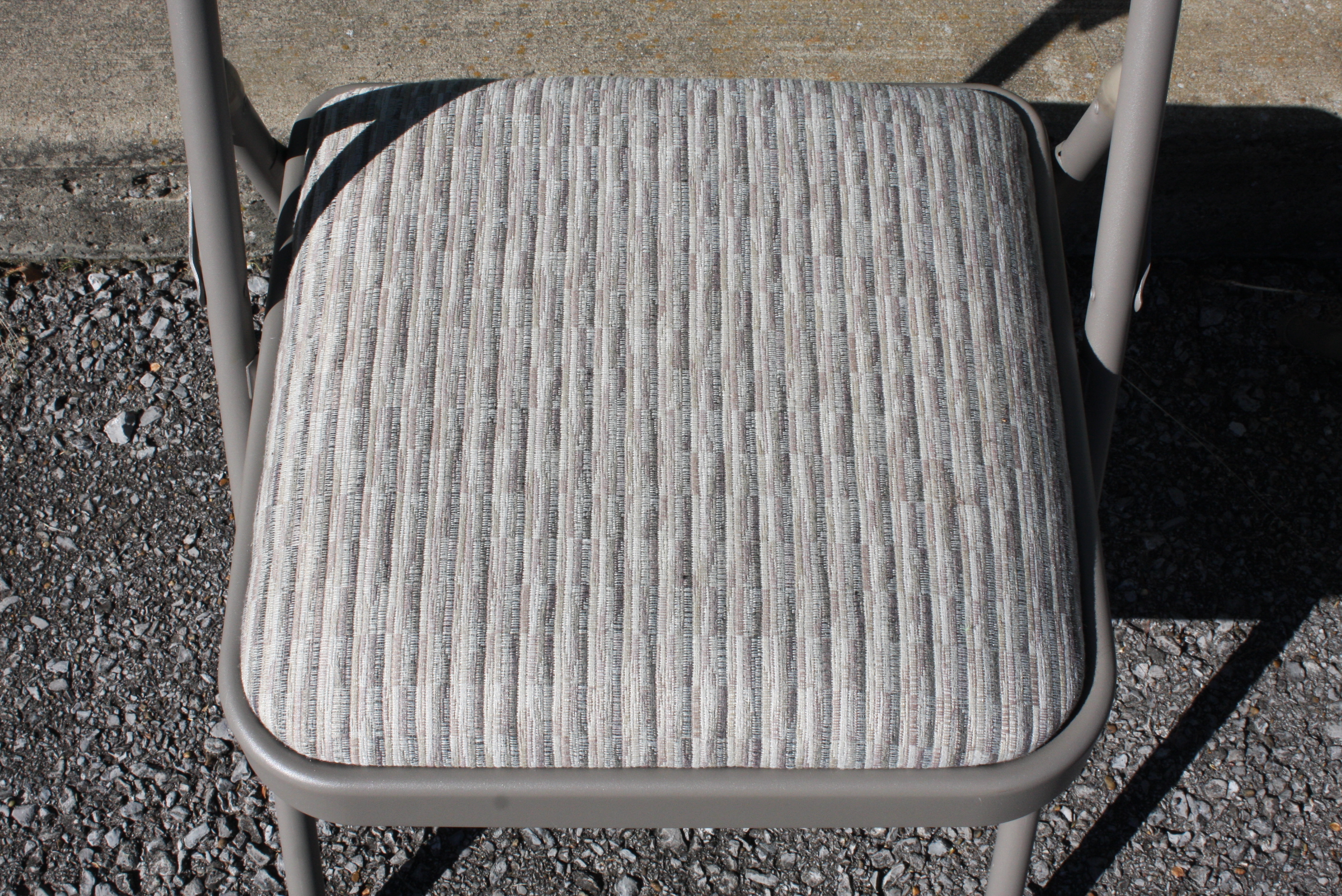 Grouping of "Sudden Comfort" Folding Chairs by Meco Corp.