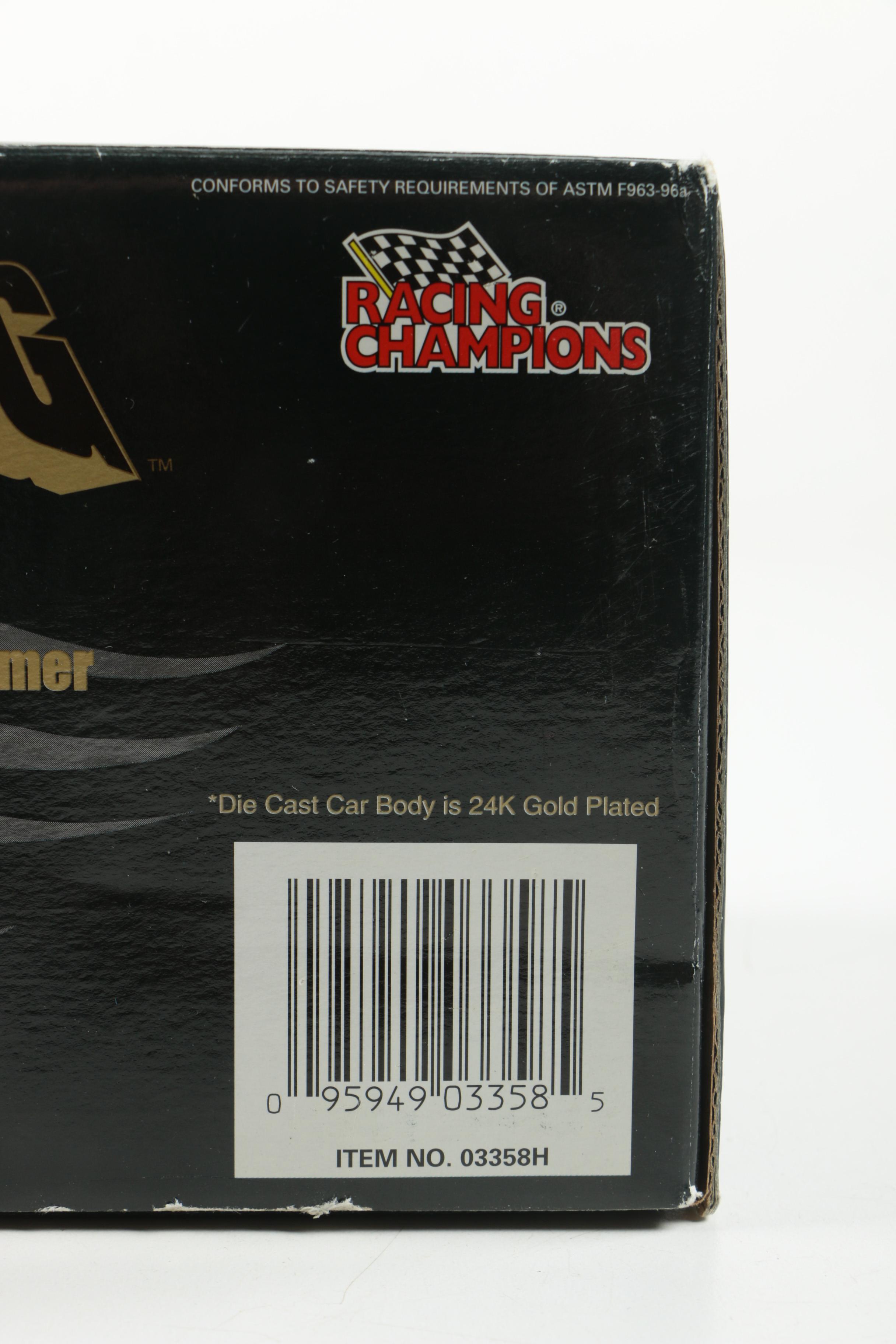 Four 24K Gold Racing Champions Die-Cast Cars