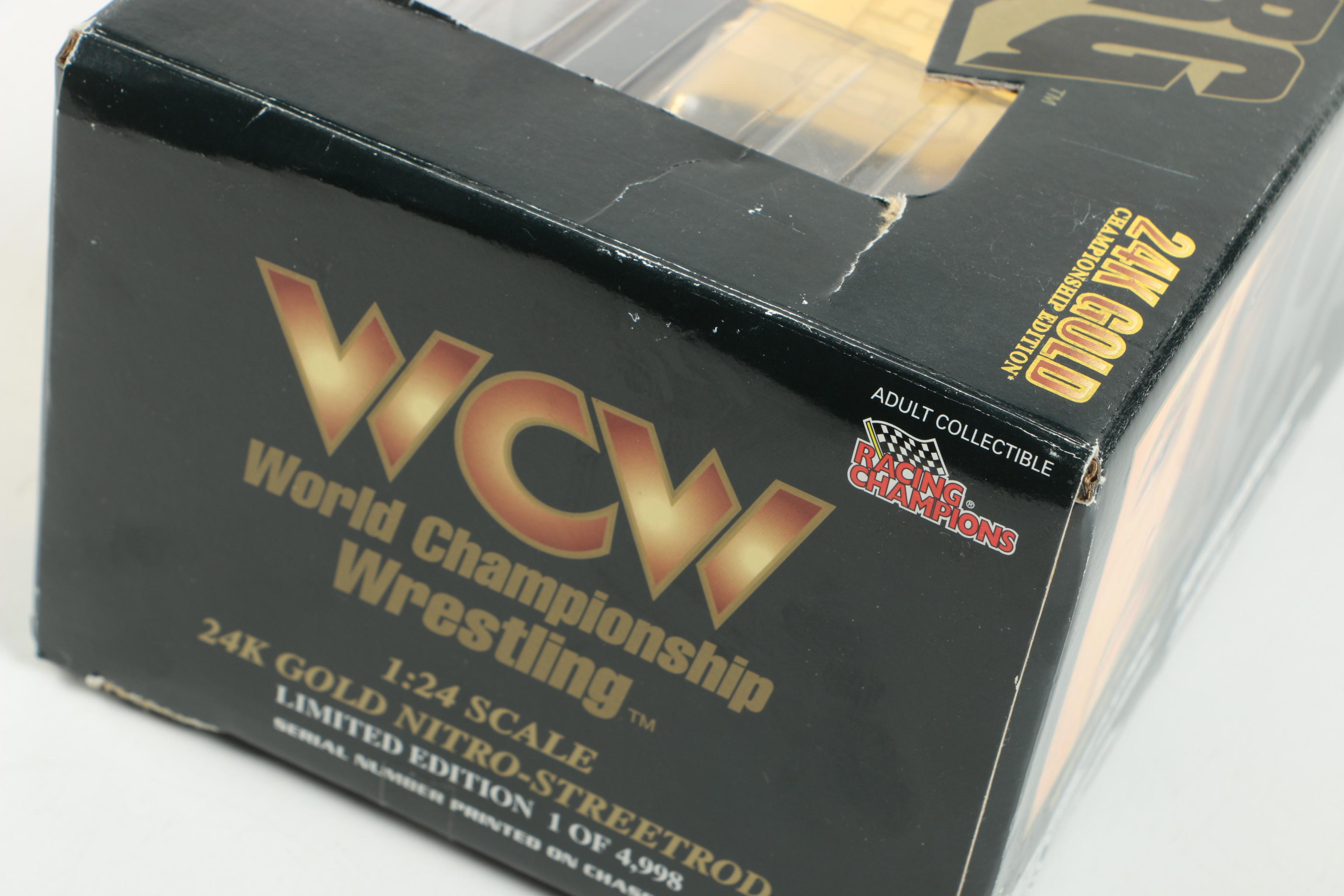 Four 24K Gold Racing Champions Die-Cast Cars