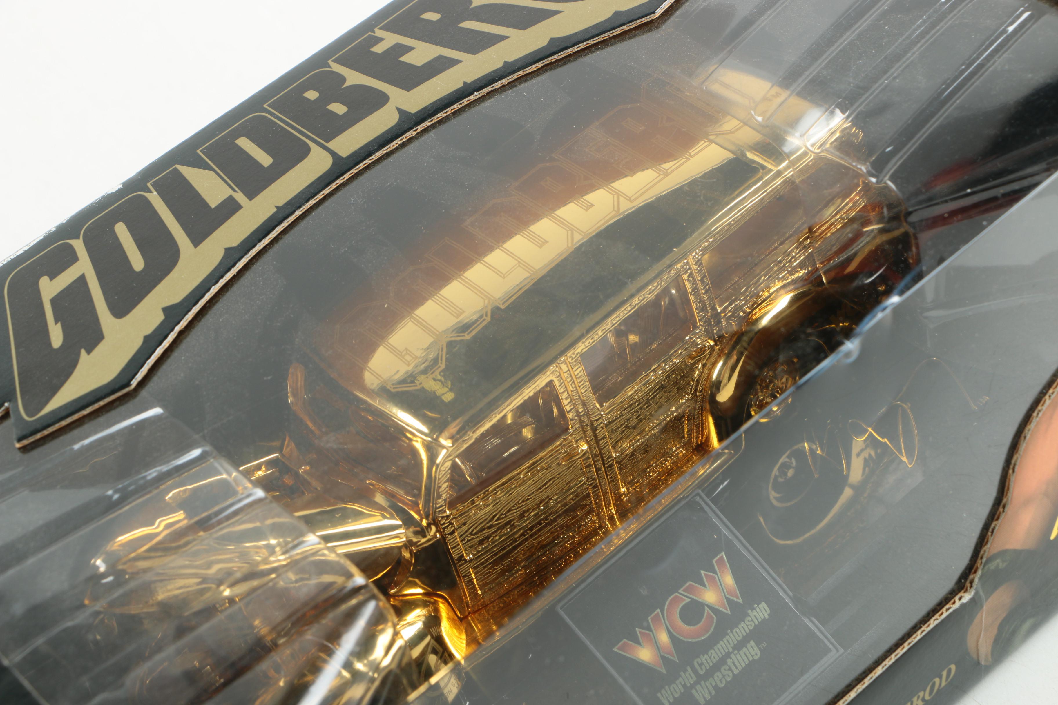 Four 24K Gold Racing Champions Die-Cast Cars