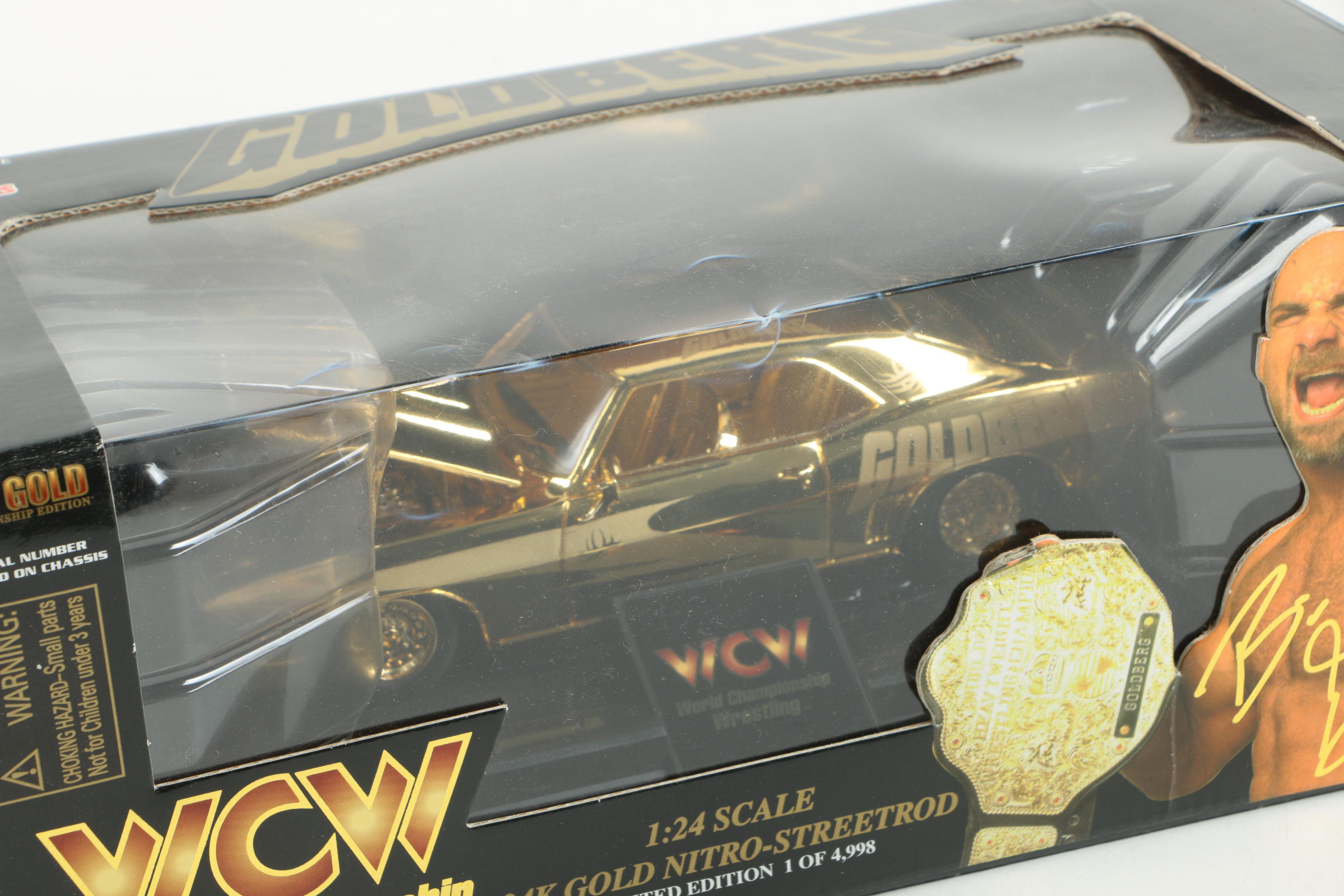 Four 24K Gold Racing Champions Die-Cast Cars