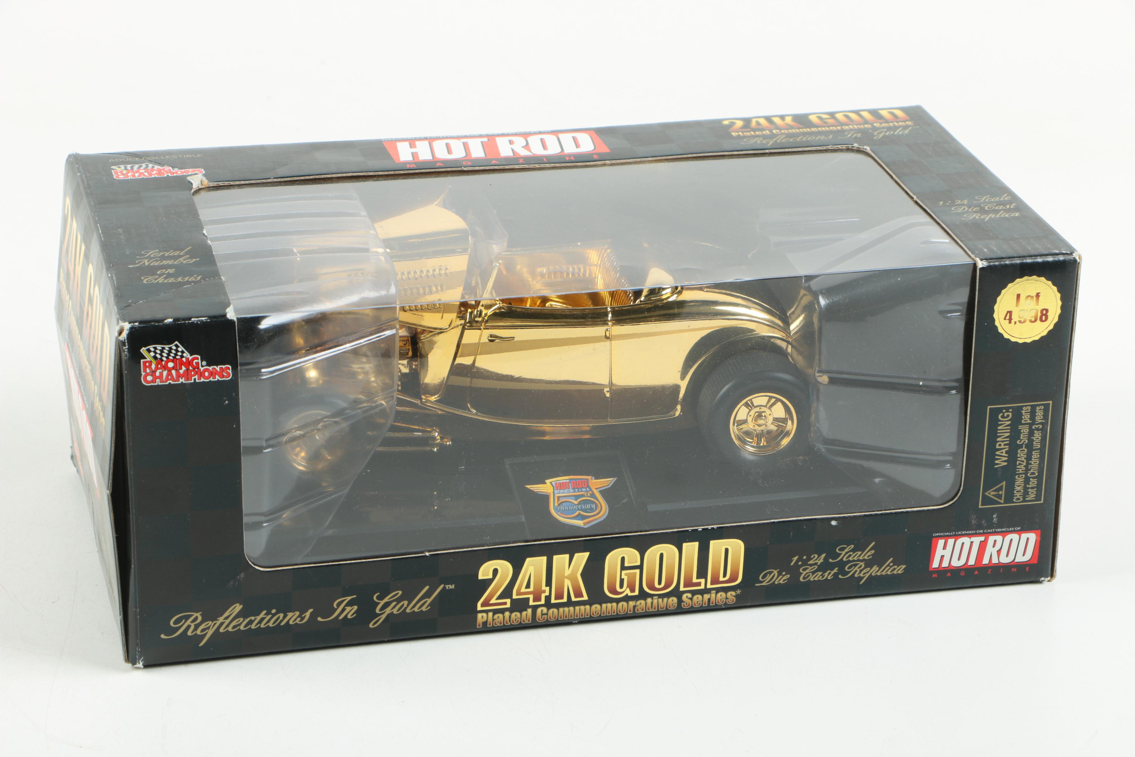 Four 24K Gold Racing Champions Die-Cast Cars