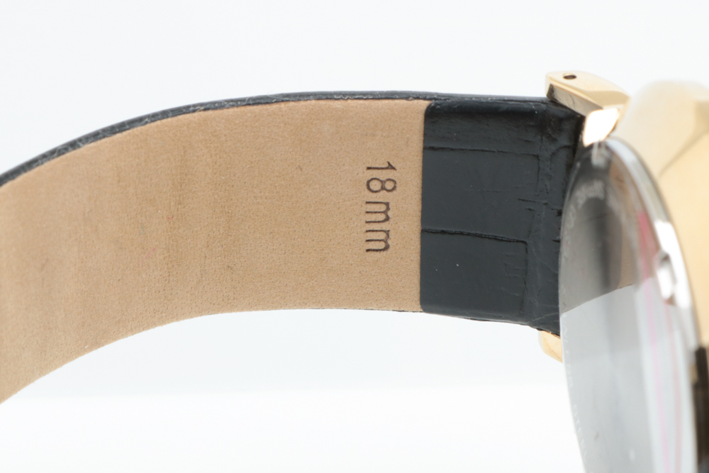 Burque Gold Toned Stainless Steel and Leather Watch