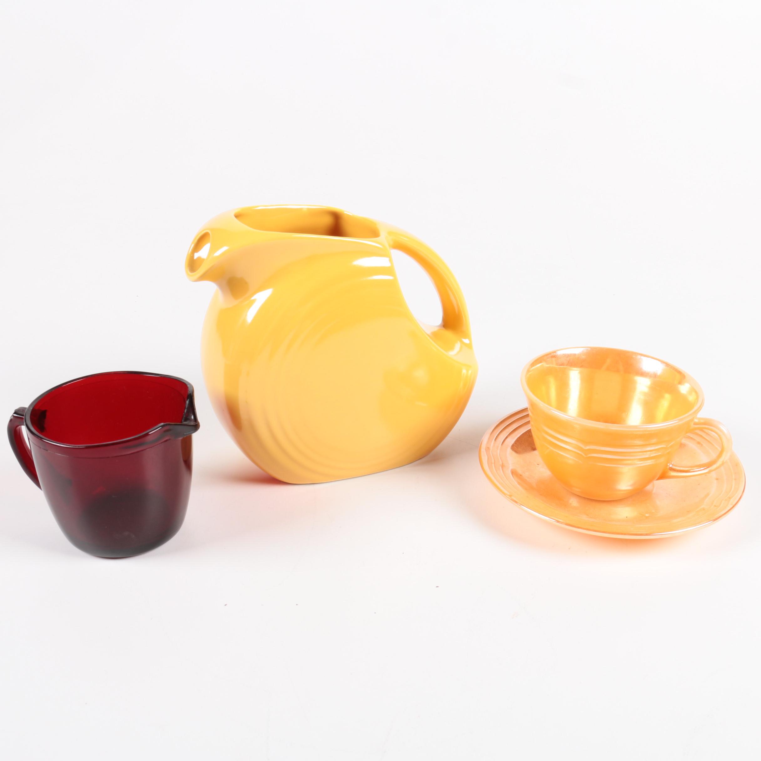 Fiesta Ware Yellow Disk Pitcher and other Tableware