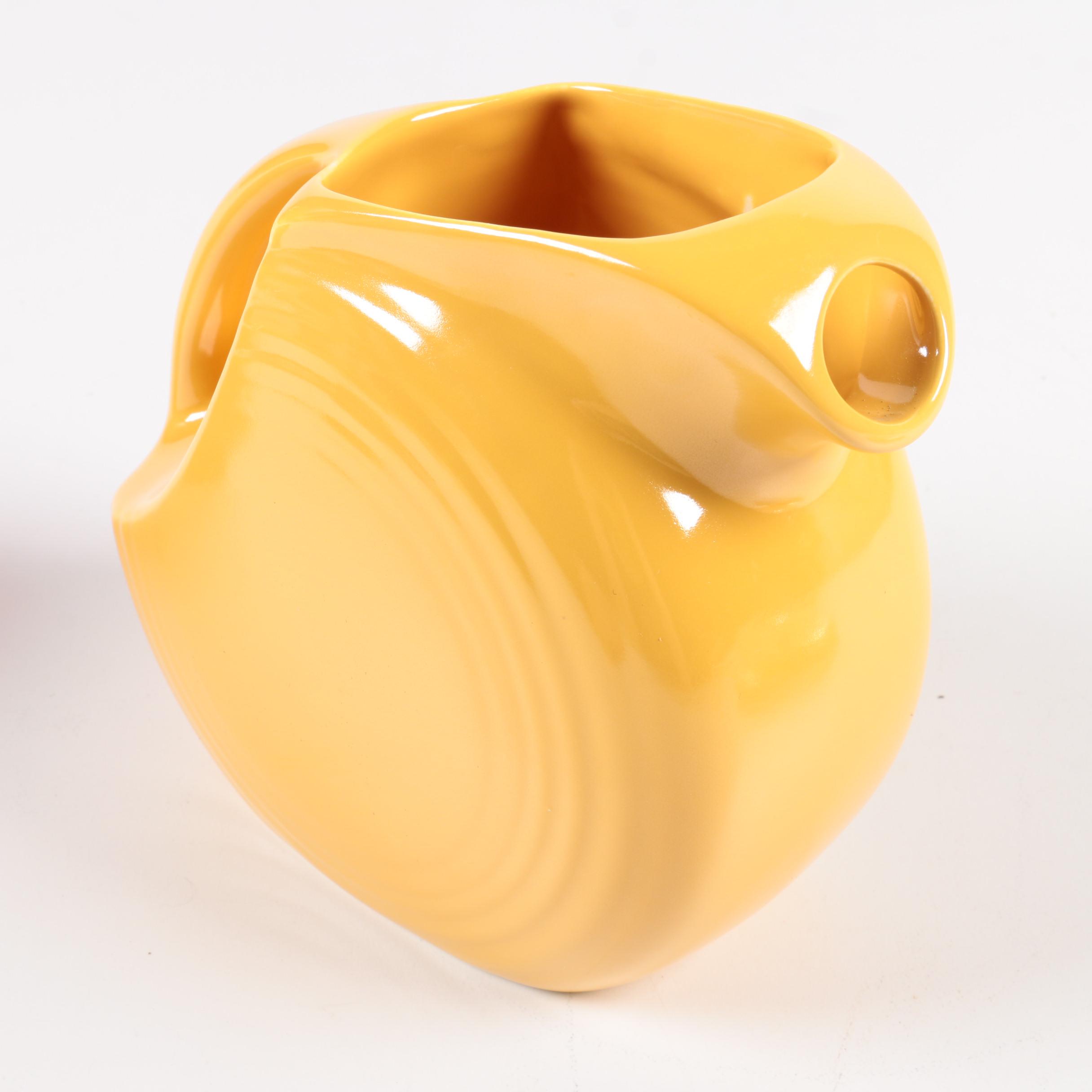 Fiesta Ware Yellow Disk Pitcher and other Tableware
