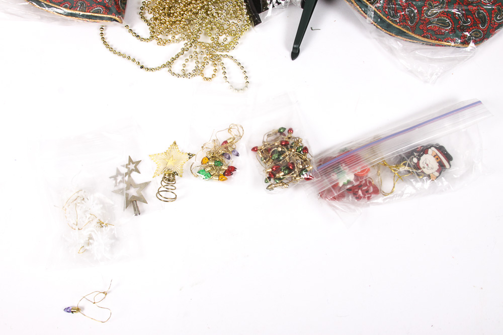 Collection of Faux Christmas Trees and Holiday Decorations