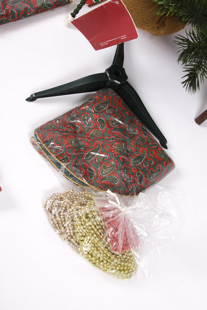 Collection of Faux Christmas Trees and Holiday Decorations