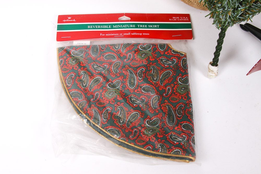 Collection of Faux Christmas Trees and Holiday Decorations