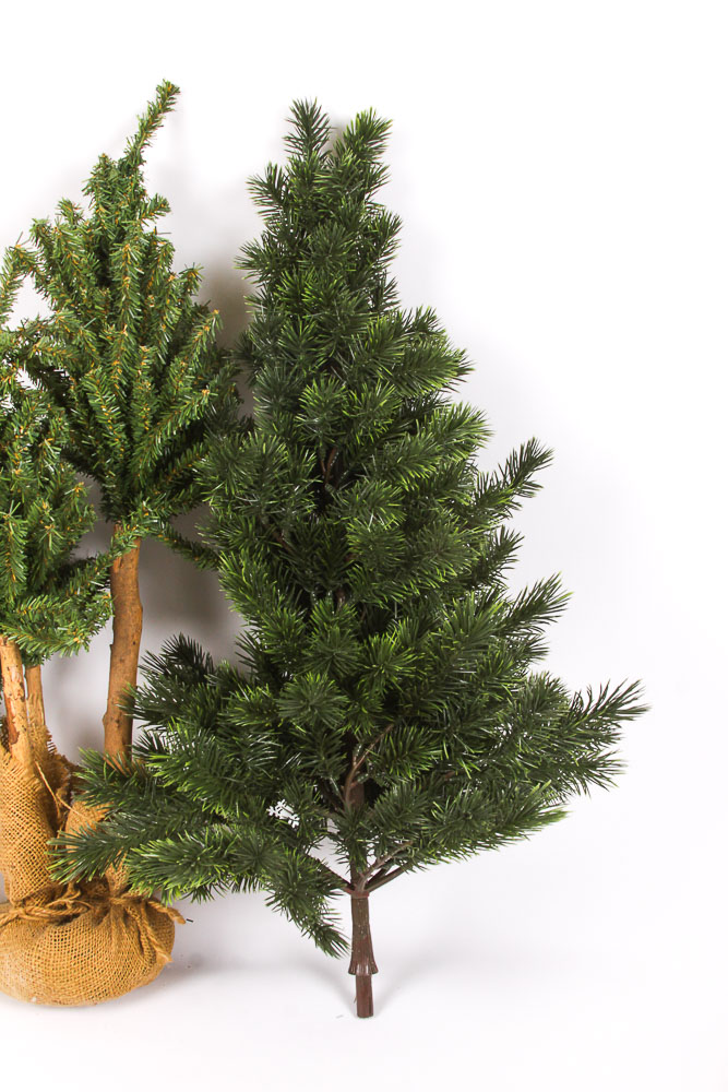 Collection of Faux Christmas Trees and Holiday Decorations