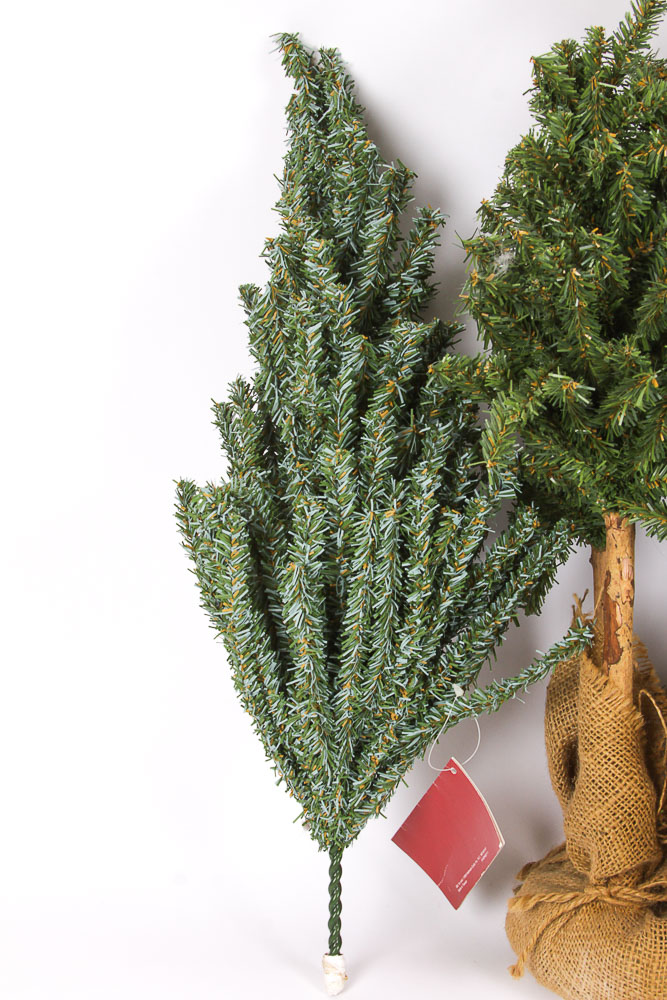 Collection of Faux Christmas Trees and Holiday Decorations