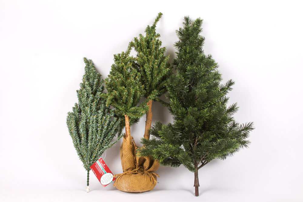 Collection of Faux Christmas Trees and Holiday Decorations