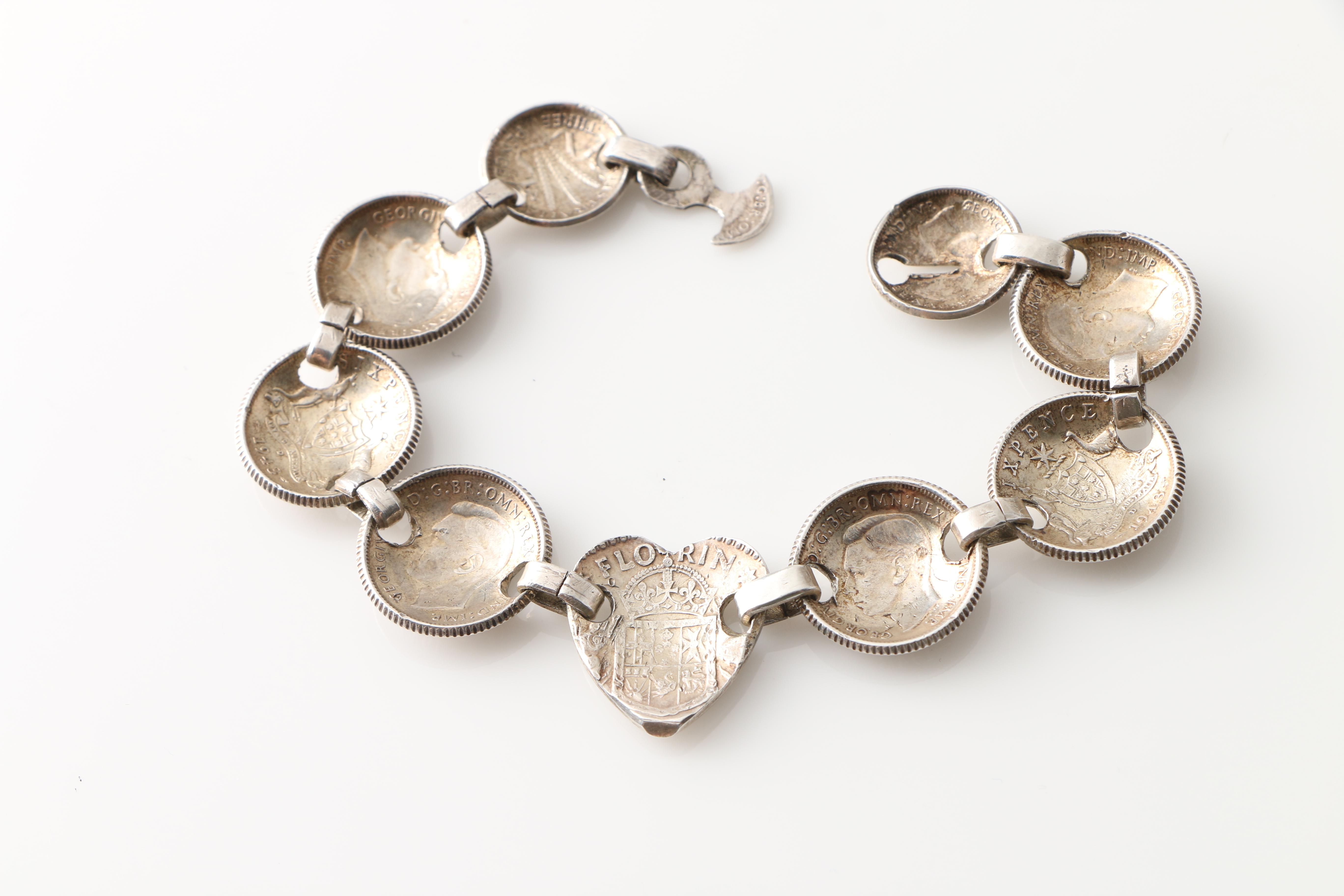 Grouping of Sterling Silver Bracelets Including an Australian Coin Bracelet