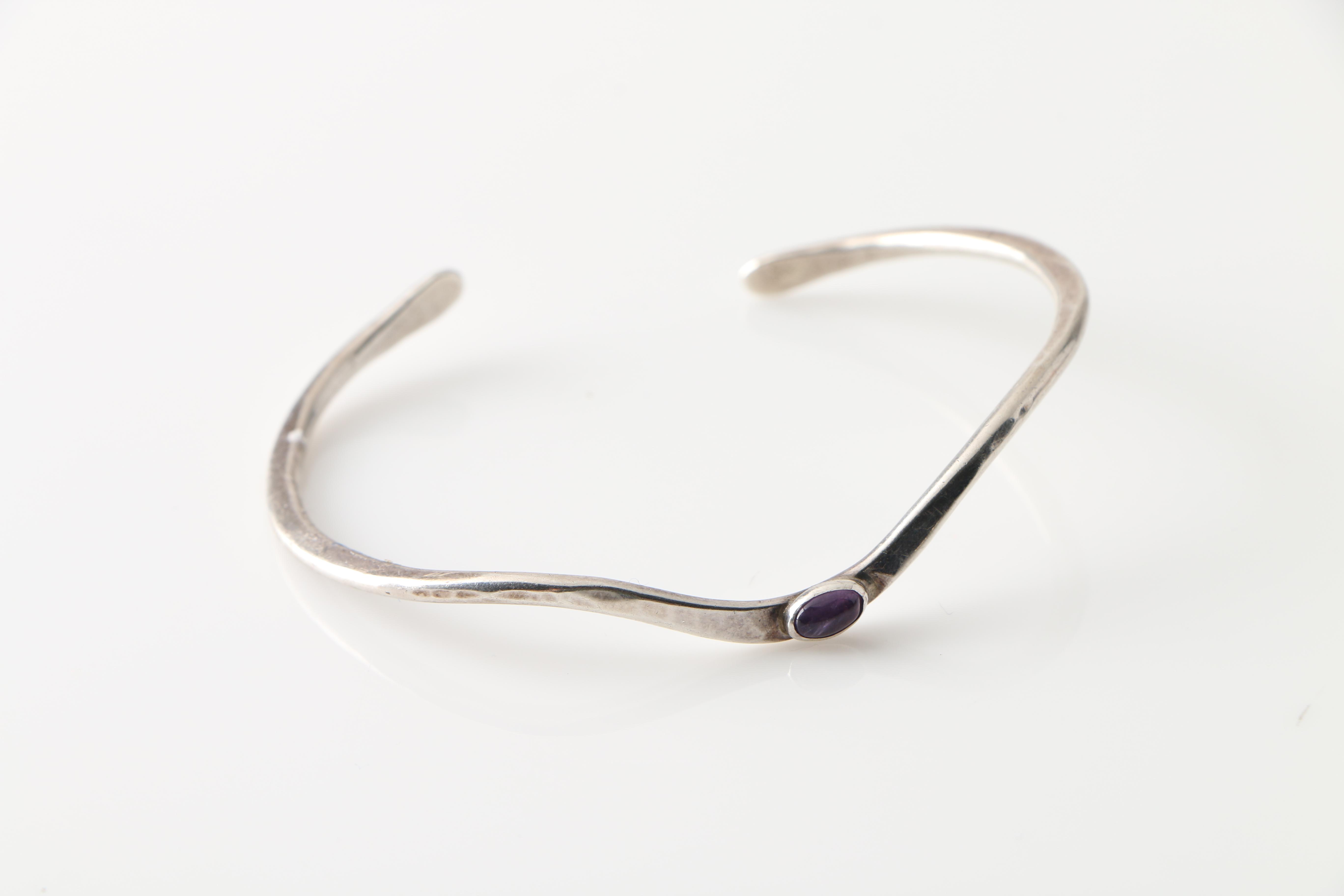 Grouping of Sterling Silver Bracelets Including an Australian Coin Bracelet