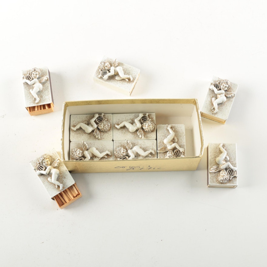 Coated Metal High Relief Cherub Motif Match Boxes With Gilt Tipped Matches