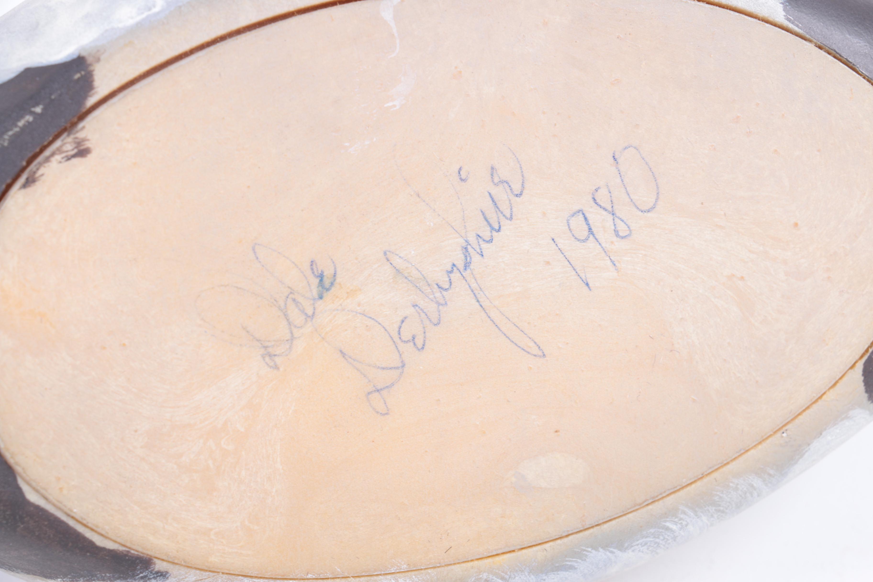 Hand-Carved Wooden Duck Decoys and Sculptures