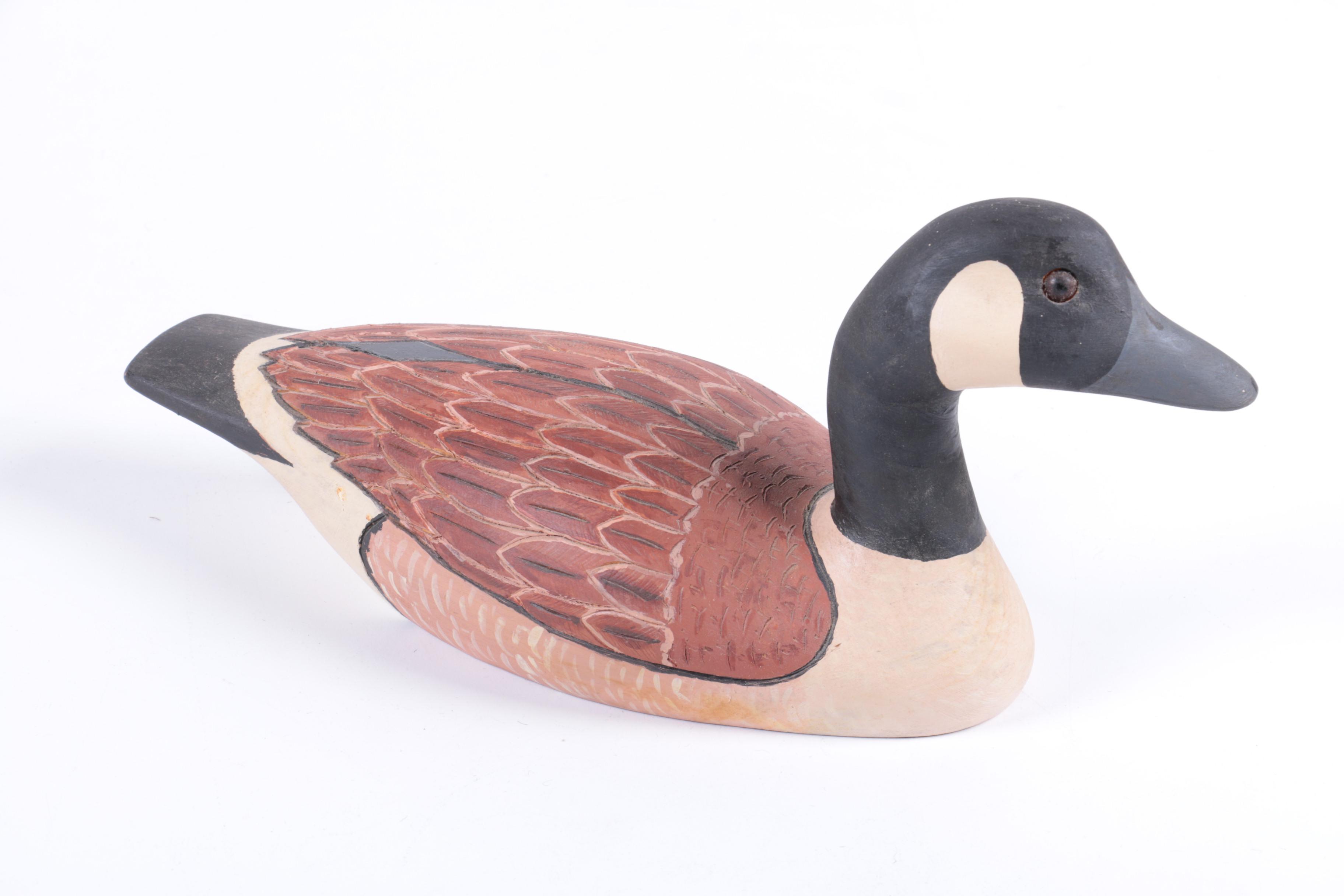 Hand-Carved Wooden Duck Decoys and Sculptures
