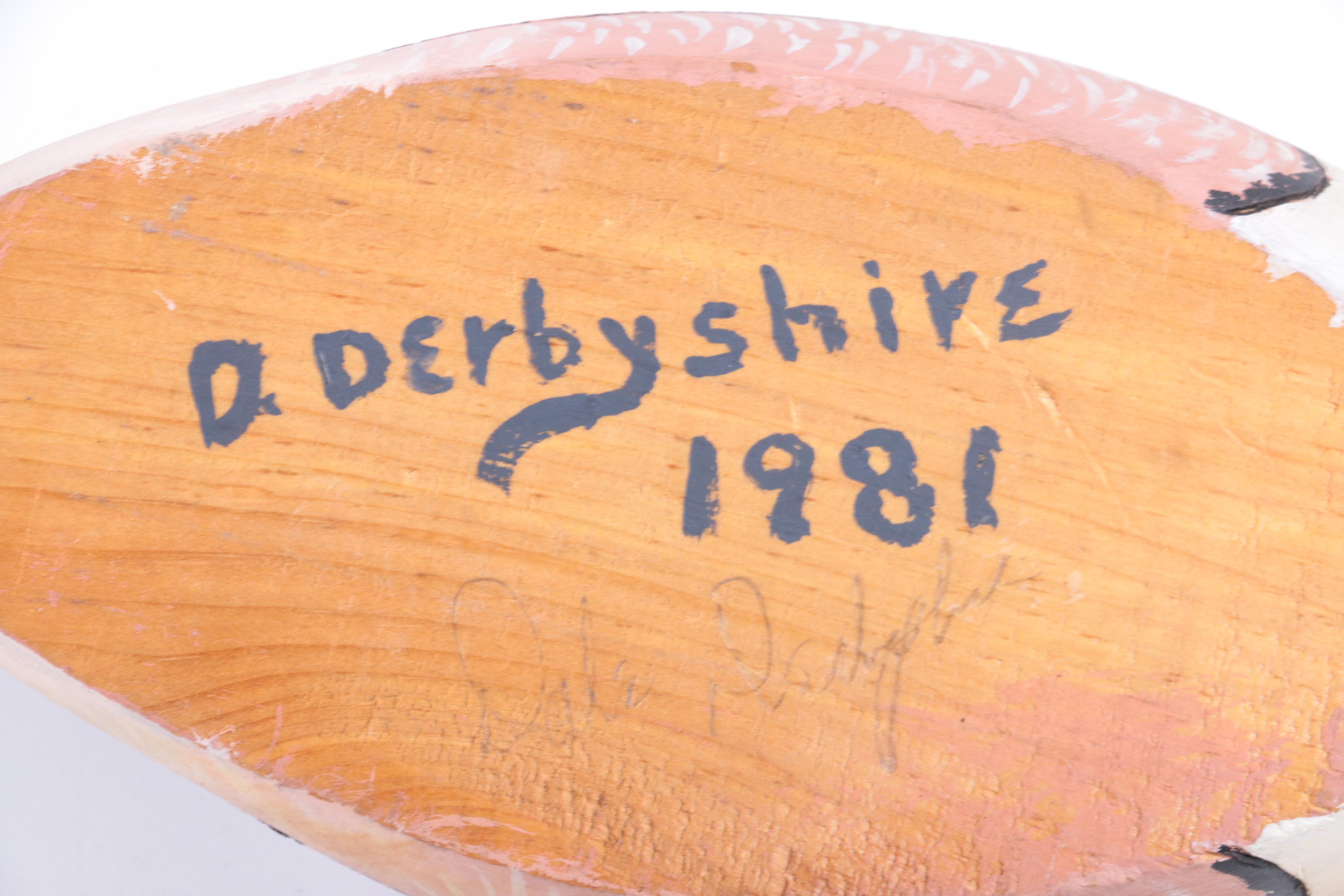 Hand-Carved Wooden Duck Decoys and Sculptures