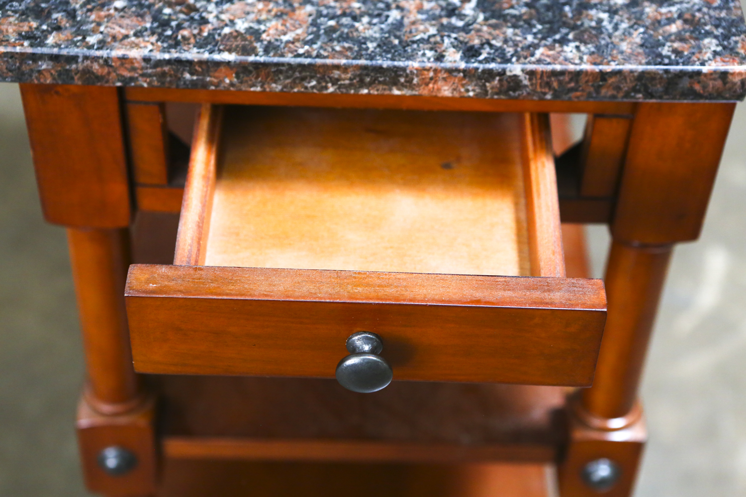 Pair of Accent Tables with Stone Tops and Shelving