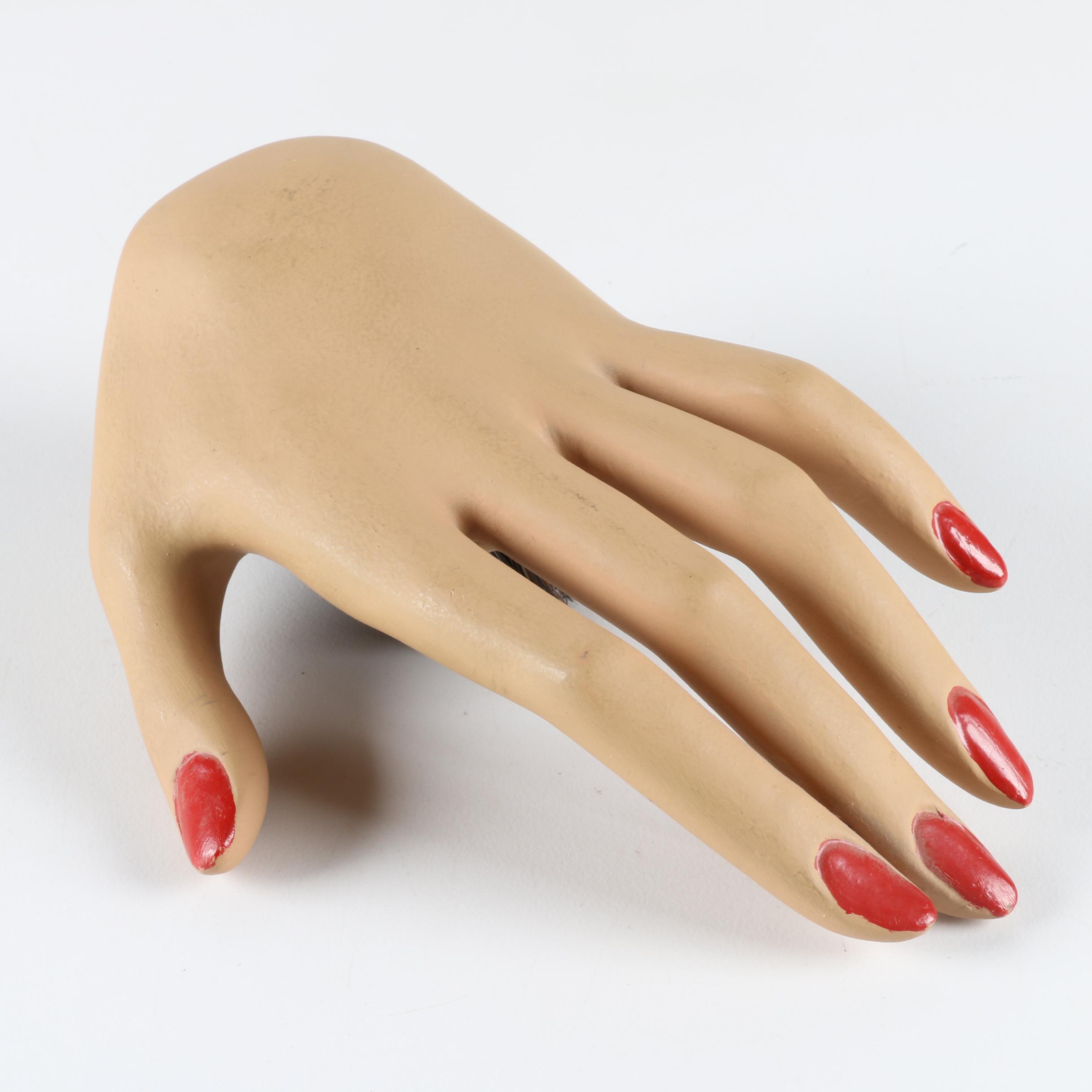 Red Nail Mannequin Hand with Brush