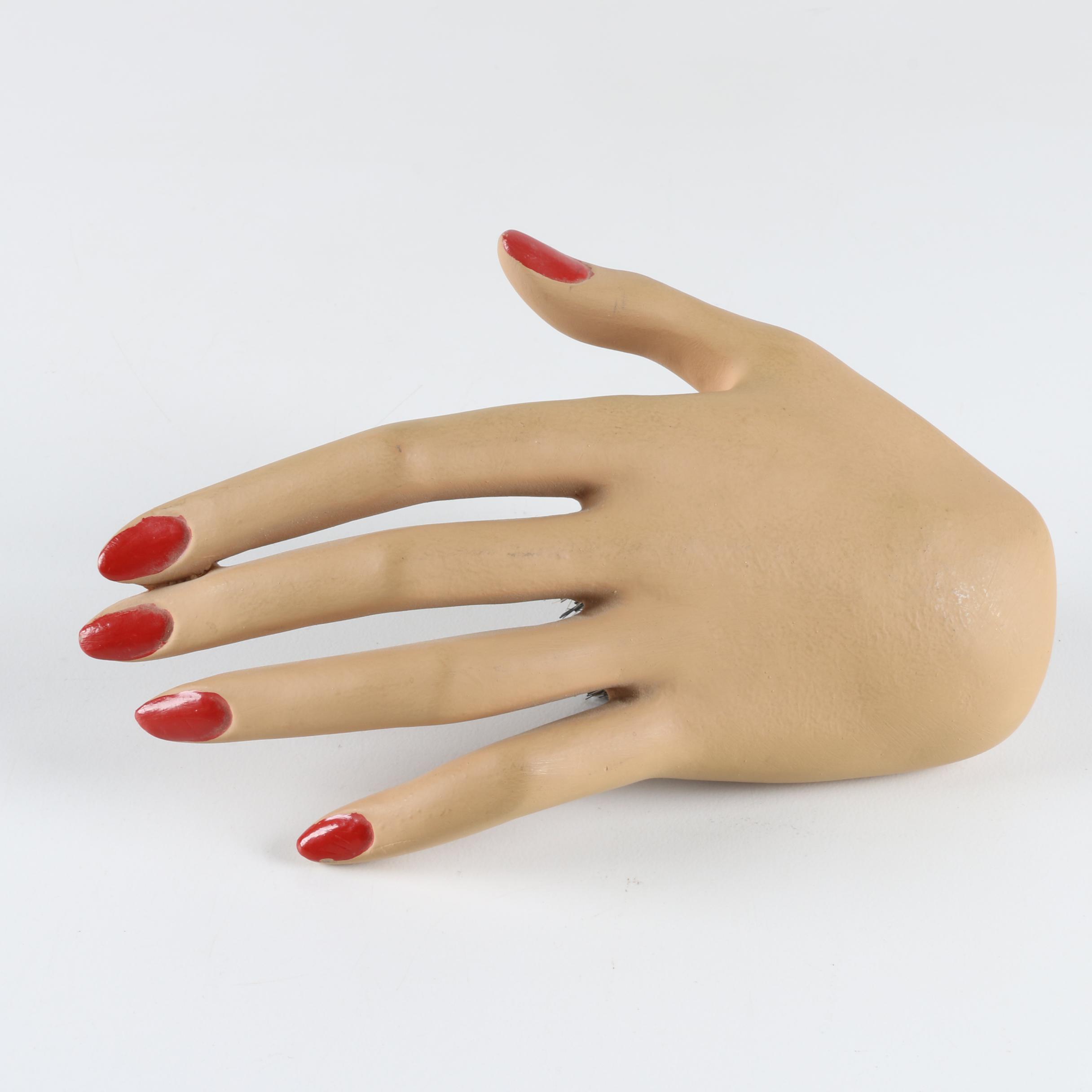 Red Nail Mannequin Hand with Brush