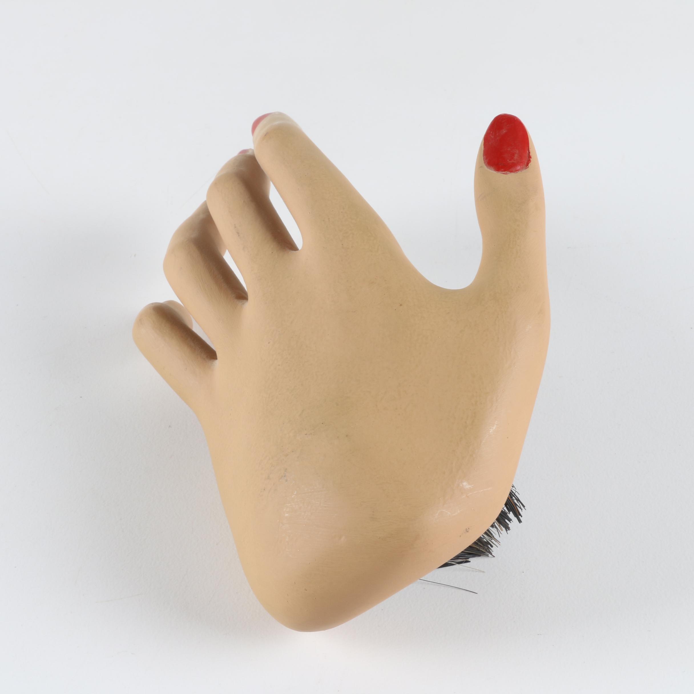 Red Nail Mannequin Hand with Brush