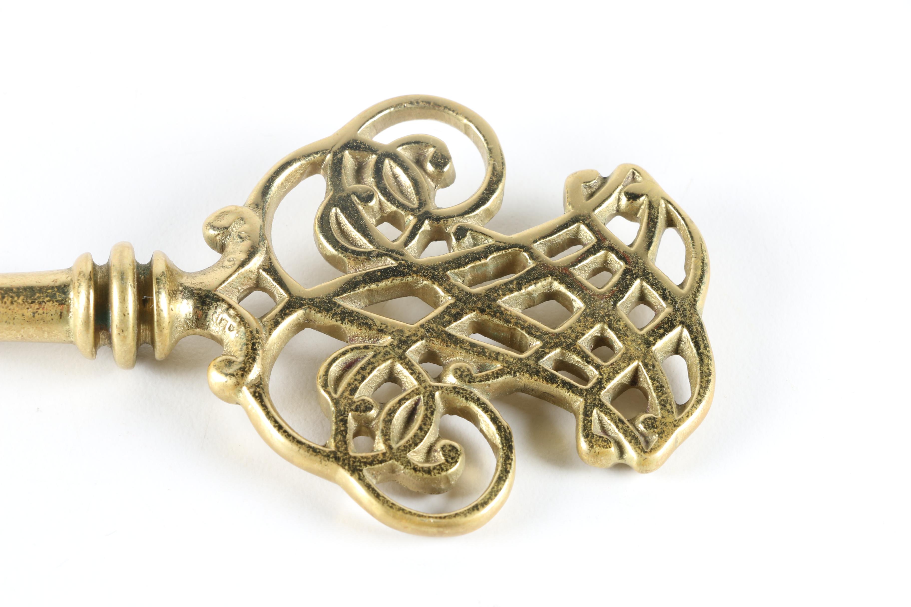 Brass Home Decor Collectibles Including a Skeleton Key