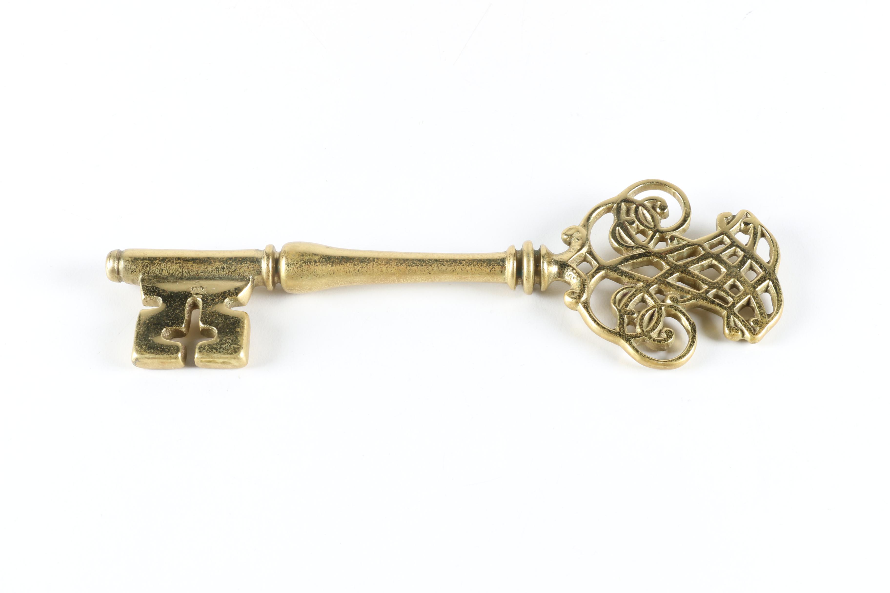 Brass Home Decor Collectibles Including a Skeleton Key