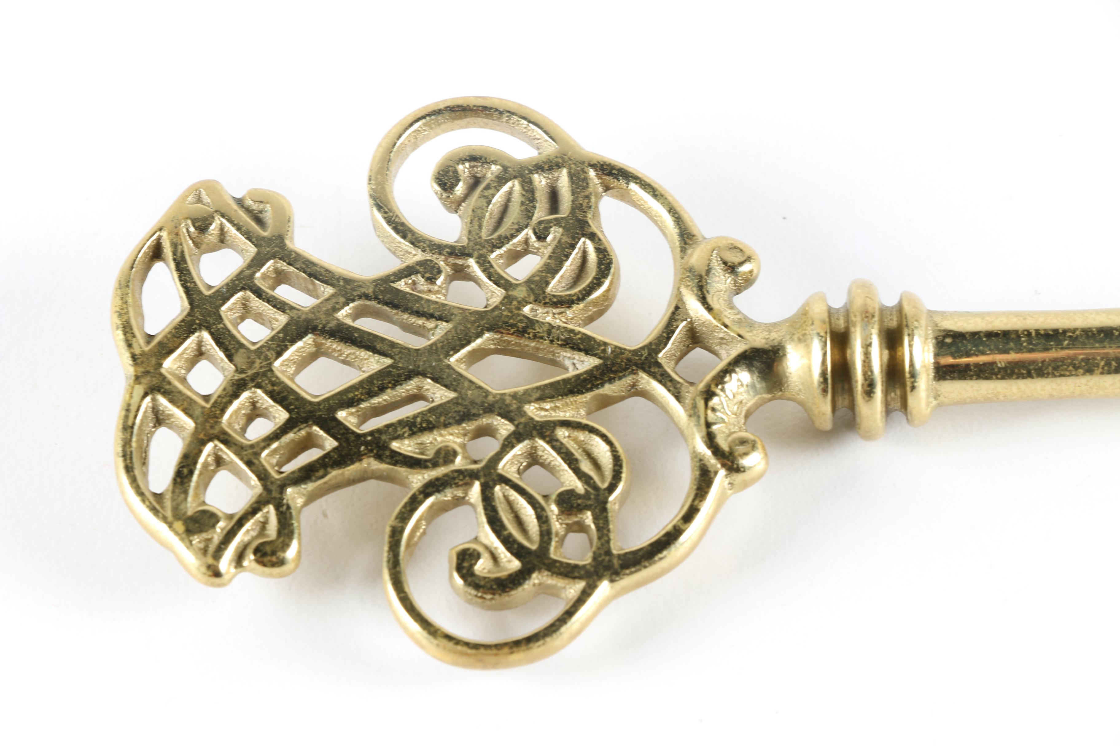 Brass Home Decor Collectibles Including a Skeleton Key