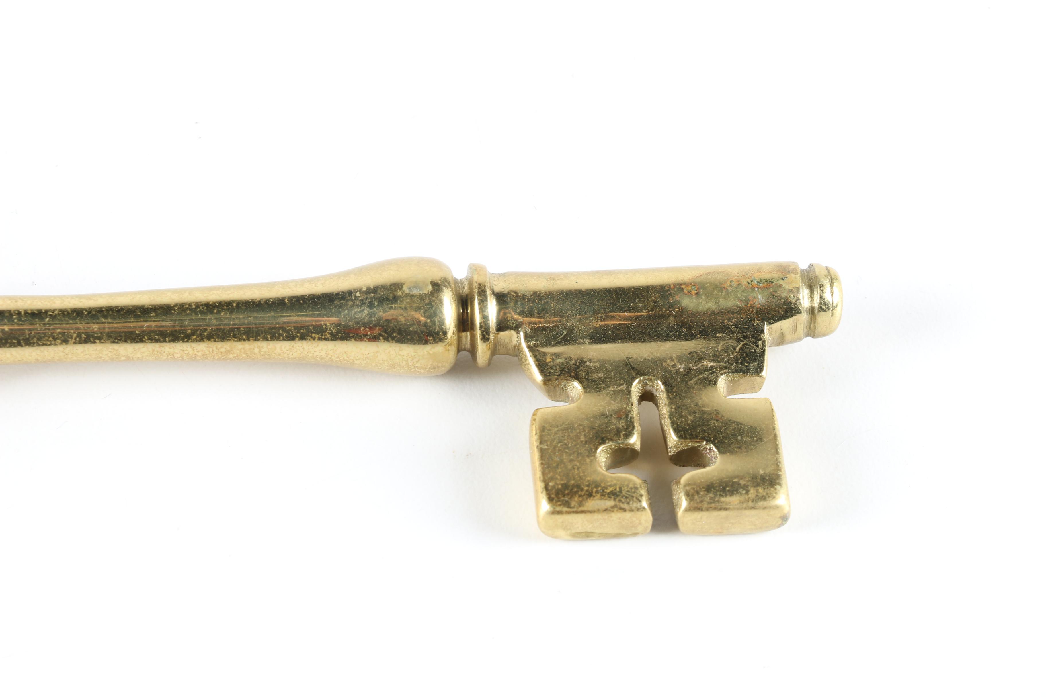 Brass Home Decor Collectibles Including a Skeleton Key