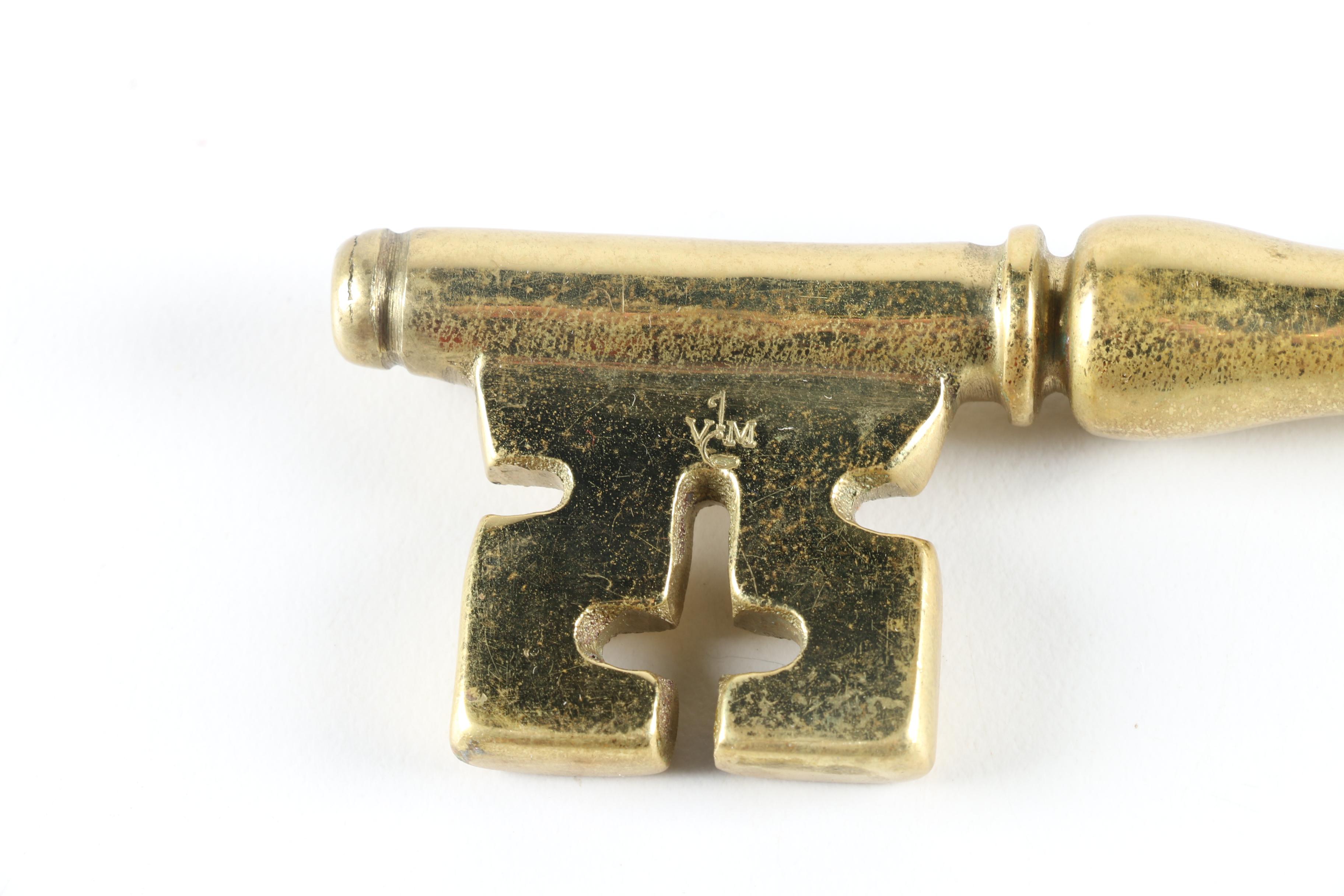 Brass Home Decor Collectibles Including a Skeleton Key