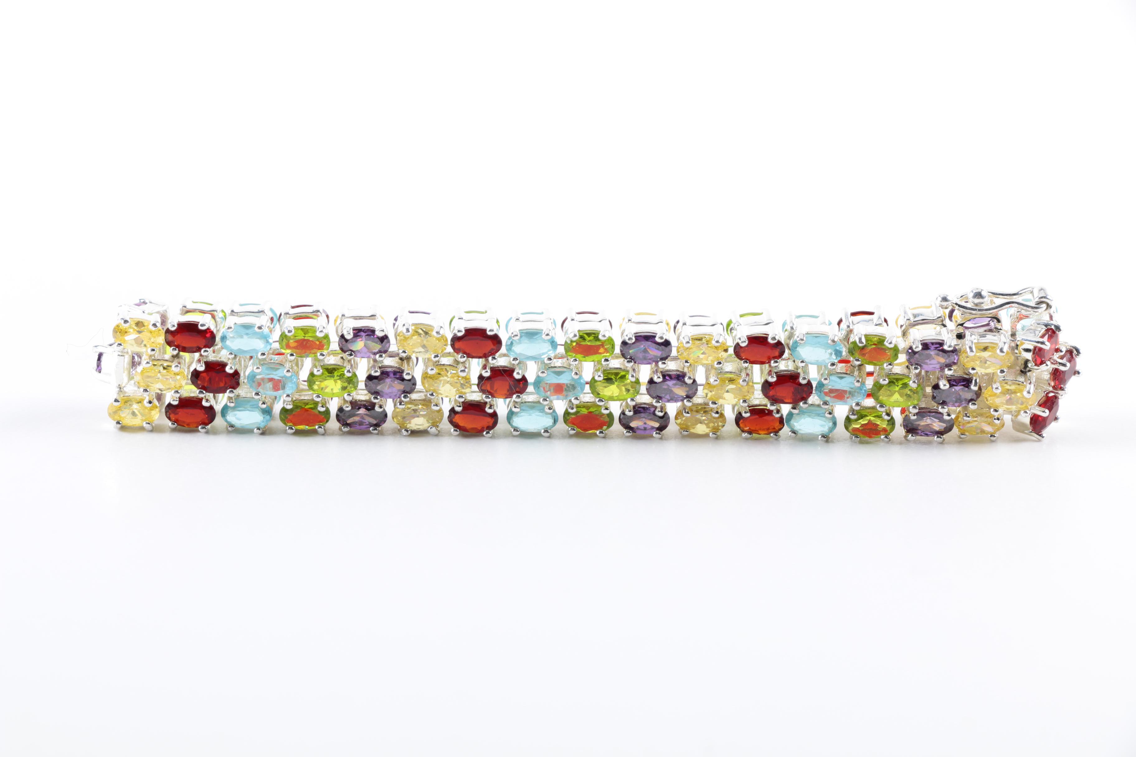 Sterling Silver Cubic Zirconia Bracelet and Ruby Earrings