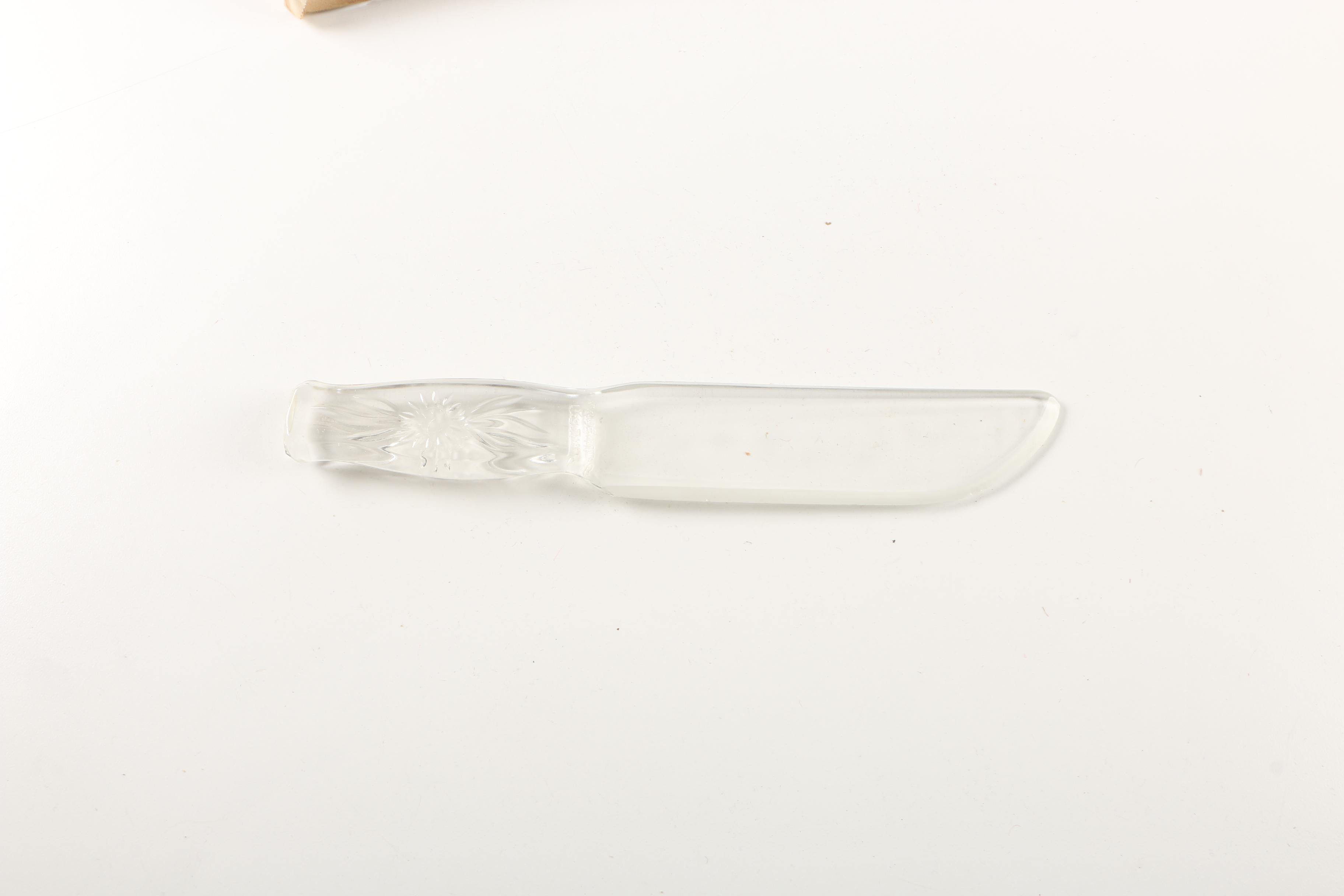 Assortment of kitchenwares featuring a Mirro cookie pastry press