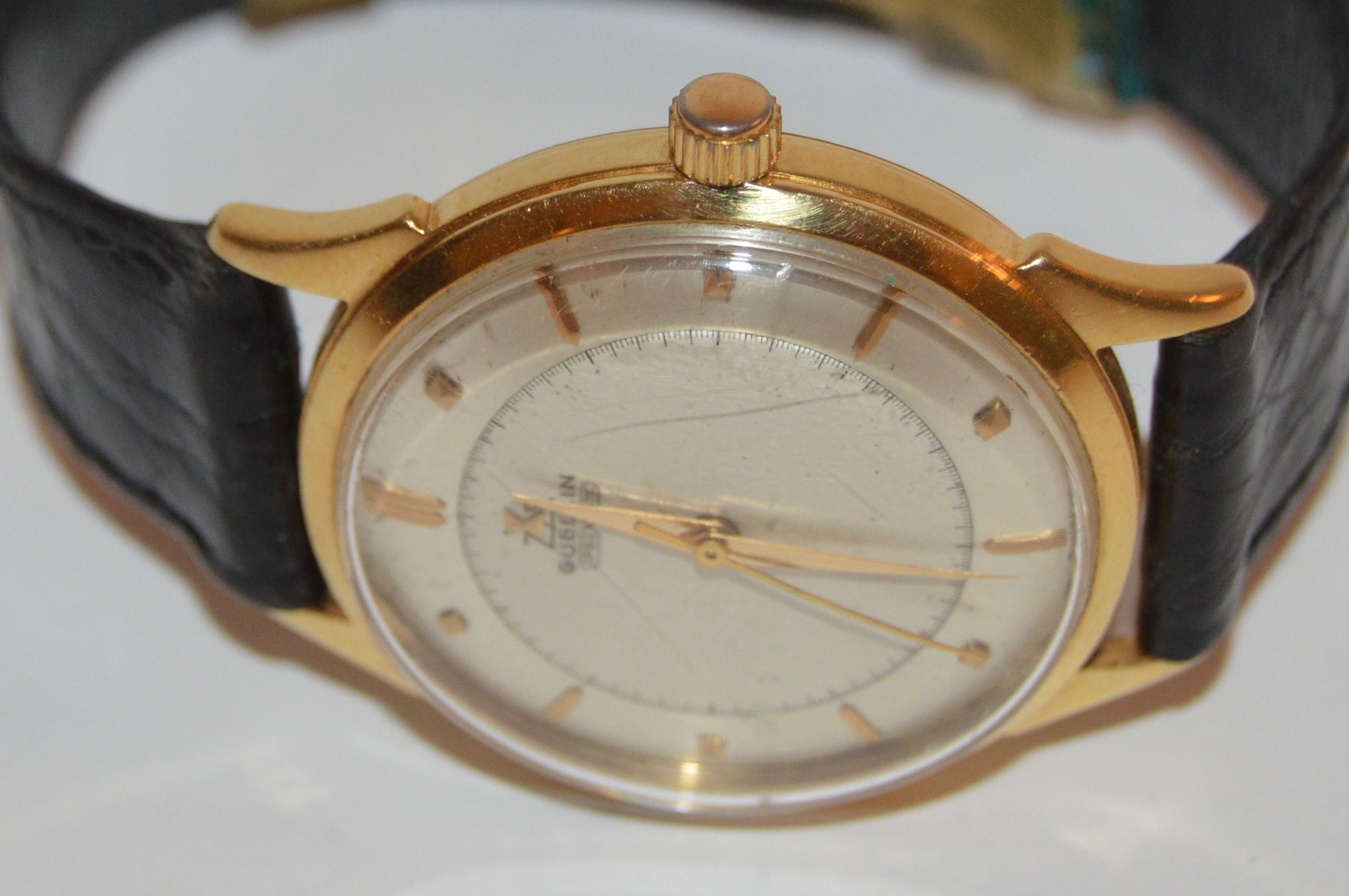 18K Yellow Gold Gübelin Watch with Black Leather Band