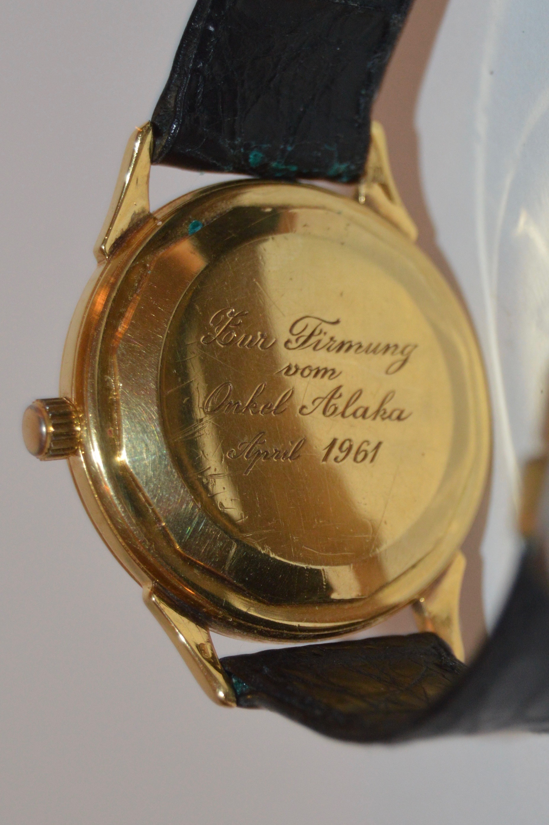 18K Yellow Gold Gübelin Watch with Black Leather Band