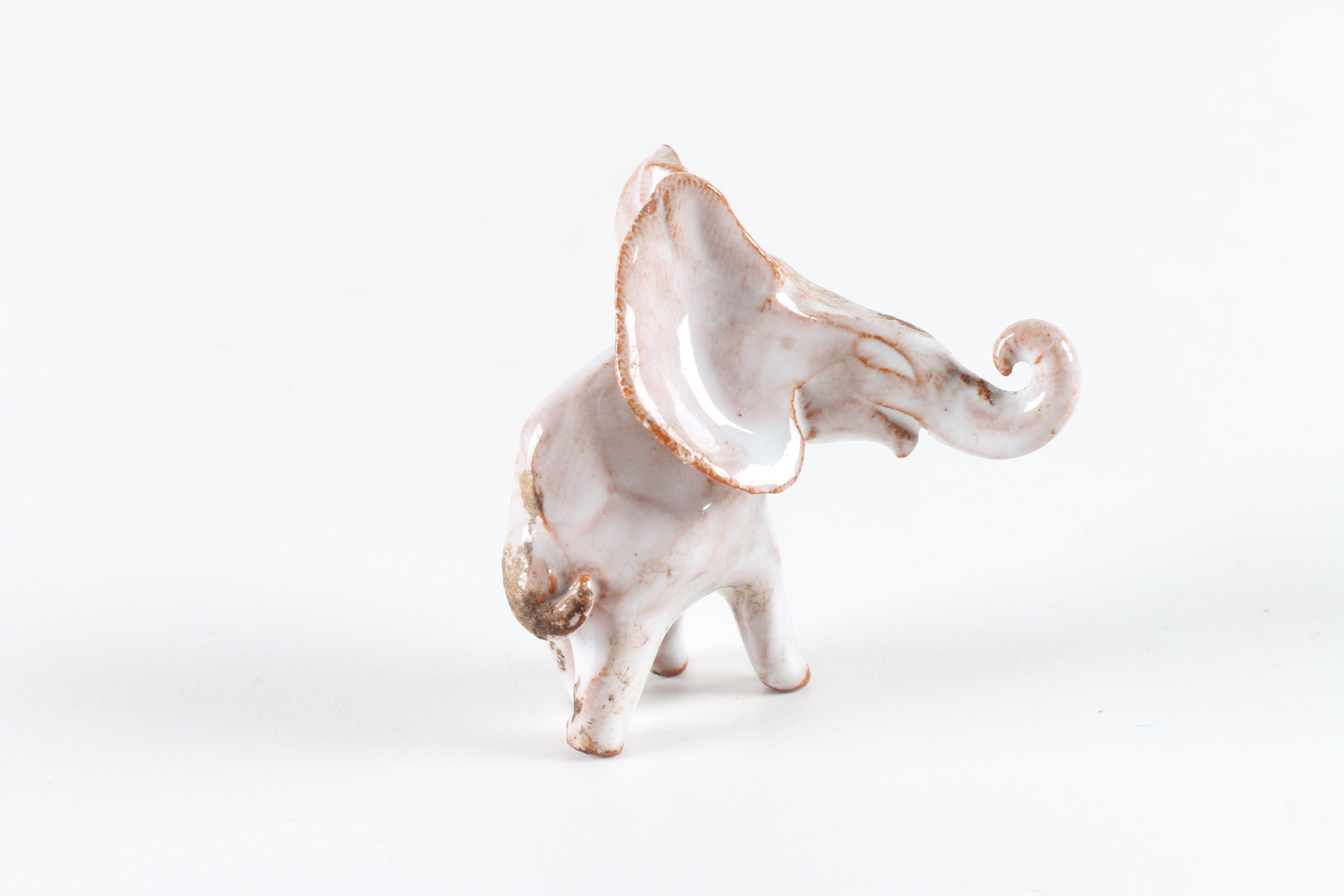Collection of Elephant Figurines and Salt and Pepper Shakers