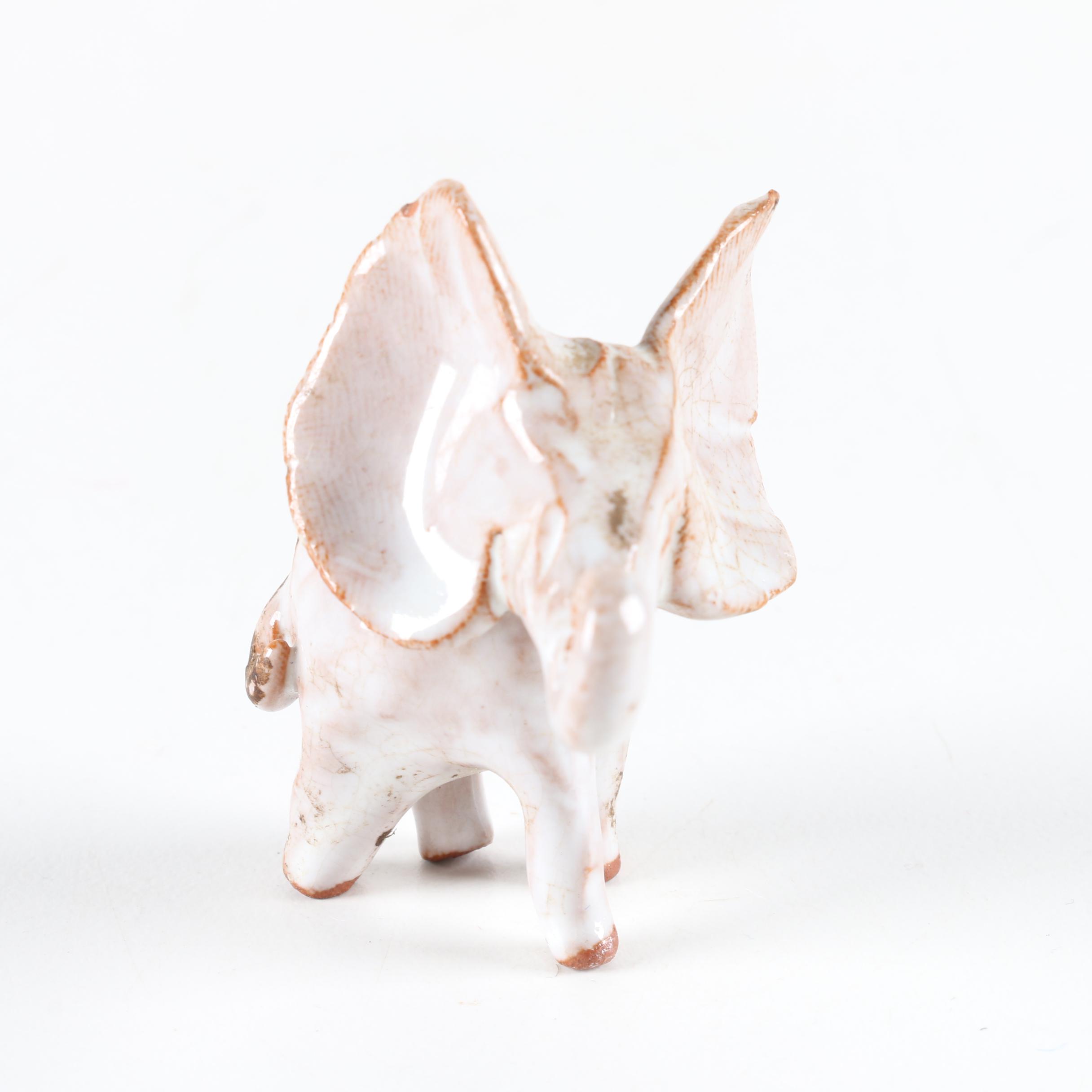 Collection of Elephant Figurines and Salt and Pepper Shakers