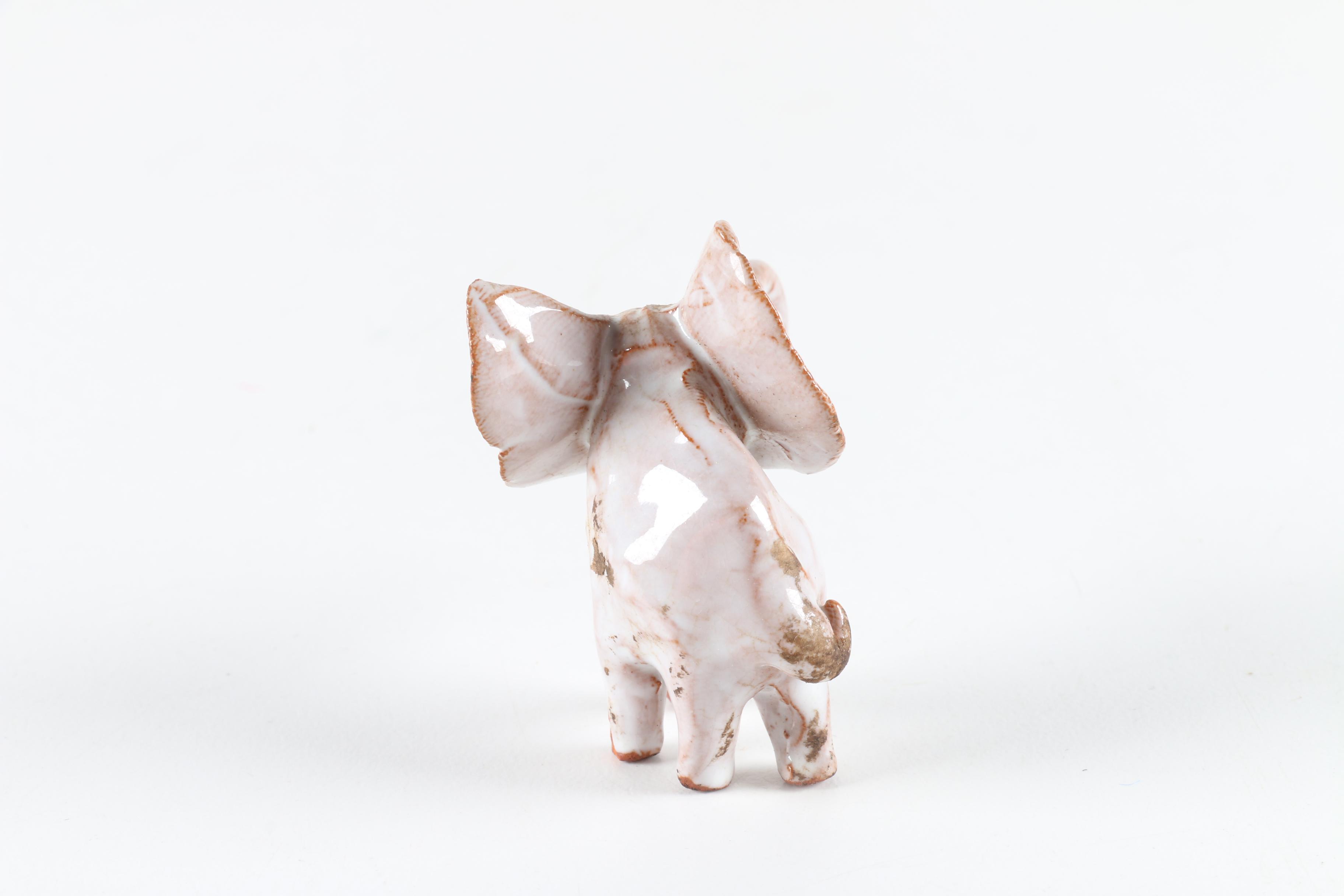 Collection of Elephant Figurines and Salt and Pepper Shakers