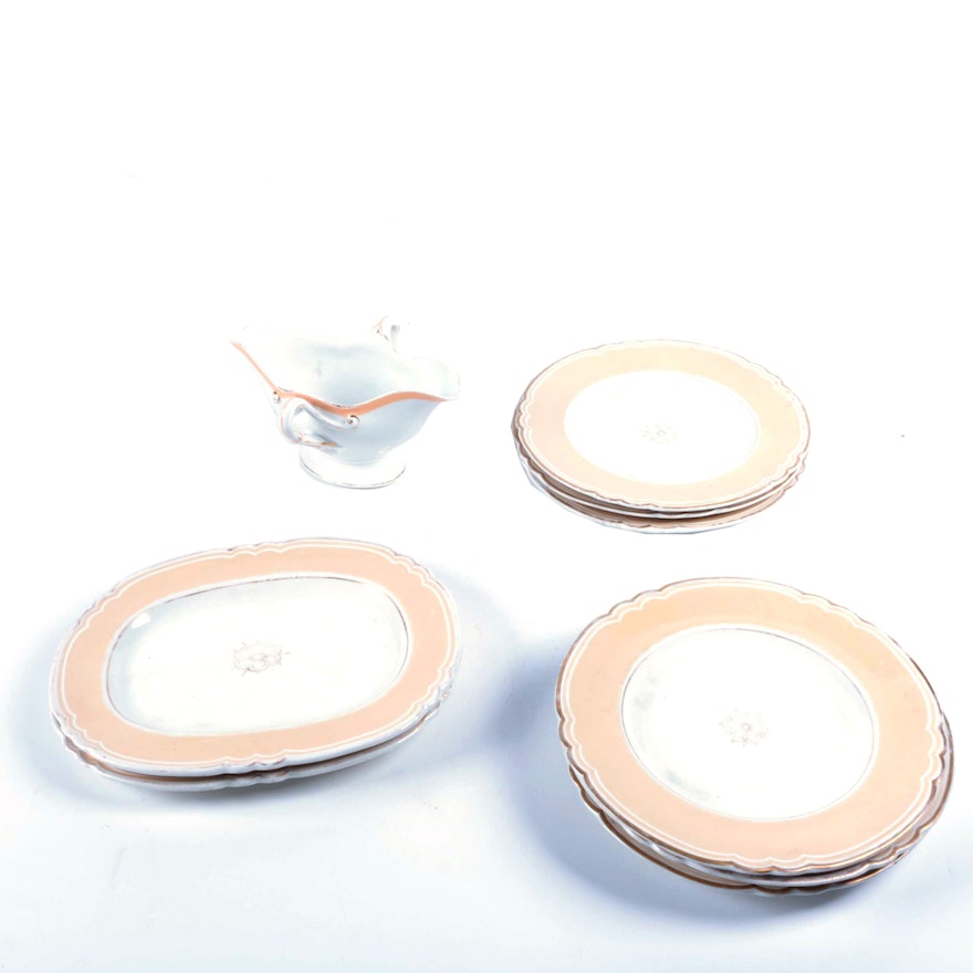 A Set of Pink Rimmed China Dishes