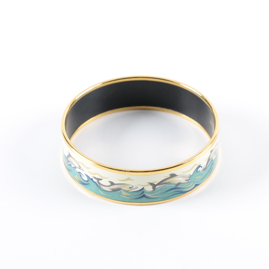 Hermès Gold Tone Enamel Dolphin Bangle Bracelet