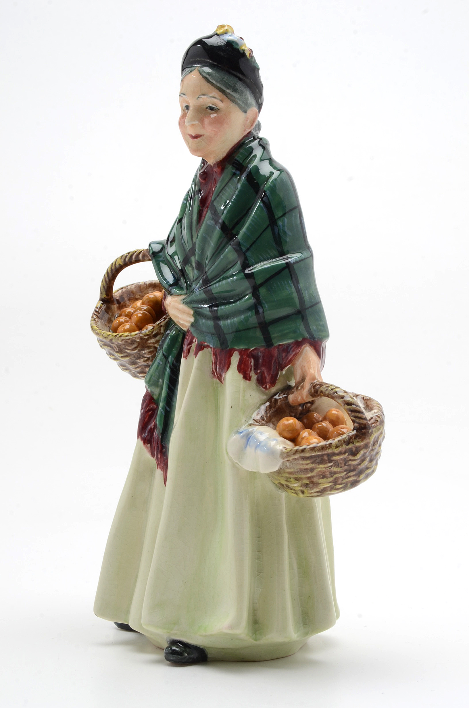 Royal Doulton Figurines "The Orange Lady" and "The Bachelor"