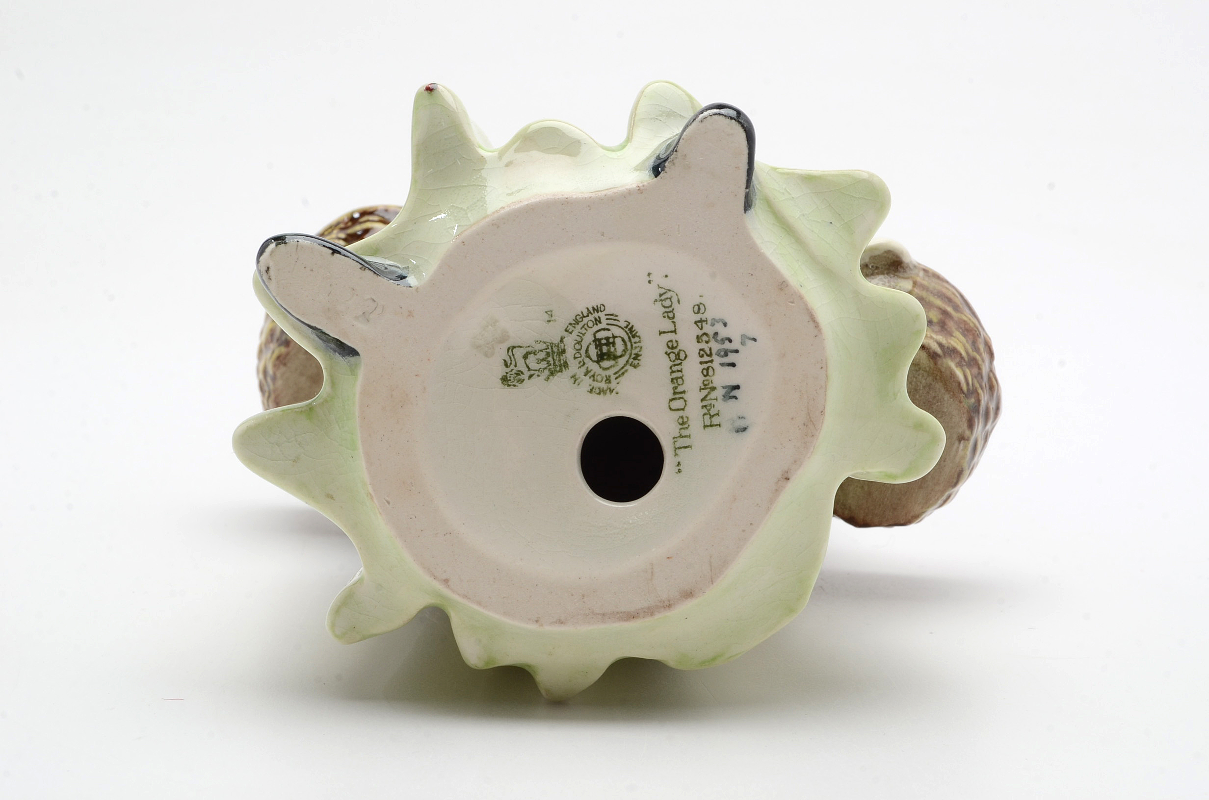 Royal Doulton Figurines "The Orange Lady" and "The Bachelor"