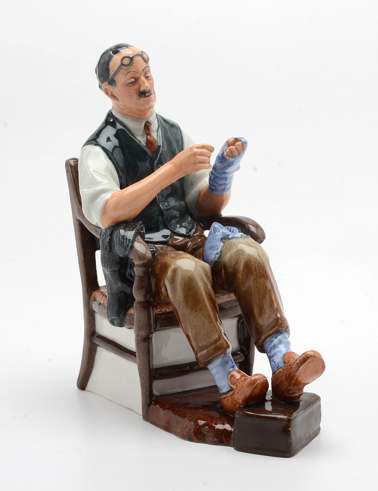 Royal Doulton Figurines "The Orange Lady" and "The Bachelor"