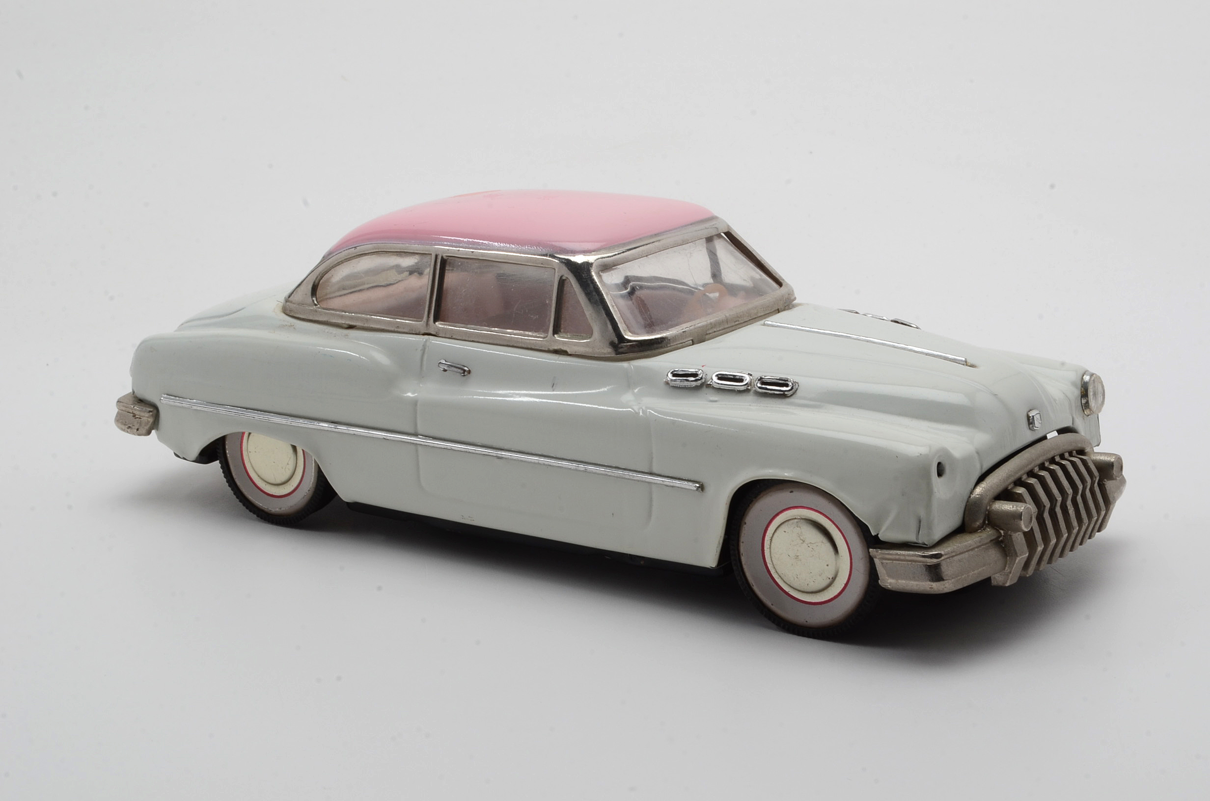 Pink and White Buick Super Die Cast Sedan
